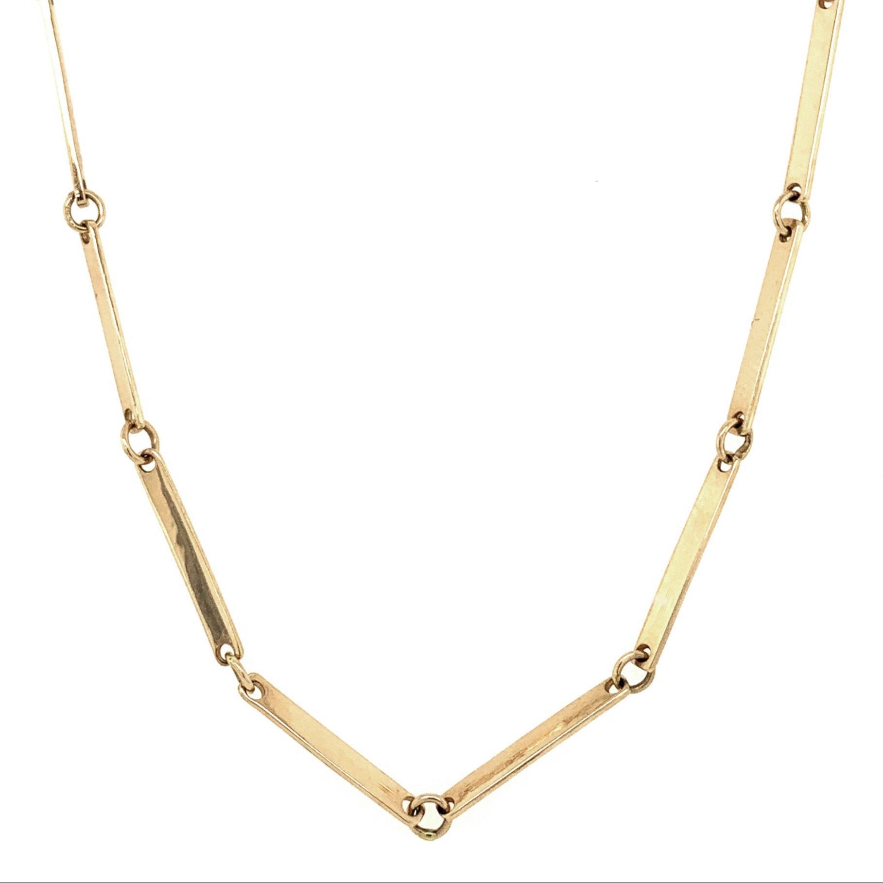 Handmade 14k Gold flat link Chain in 14k yellow gold on white background