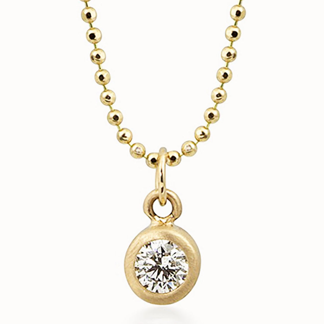 14k yellow gold OTTO diamond pendant in bezel setting