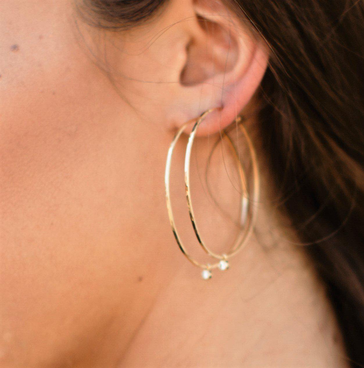 14k yellow gold ORMS medium with diamond BEZI charms on model