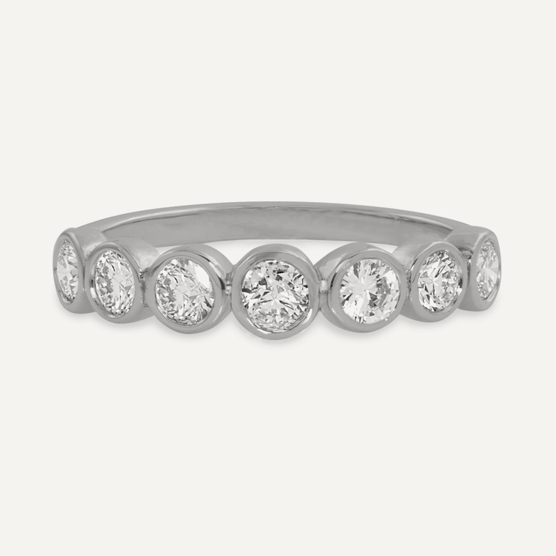 14k white gold half eternity REMO band with 7 bezel set white diamonds