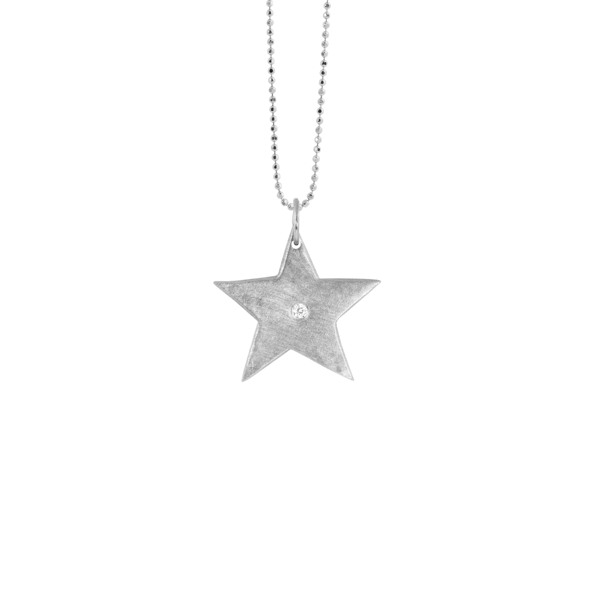 14k gold star pendant with single white diamond on white background