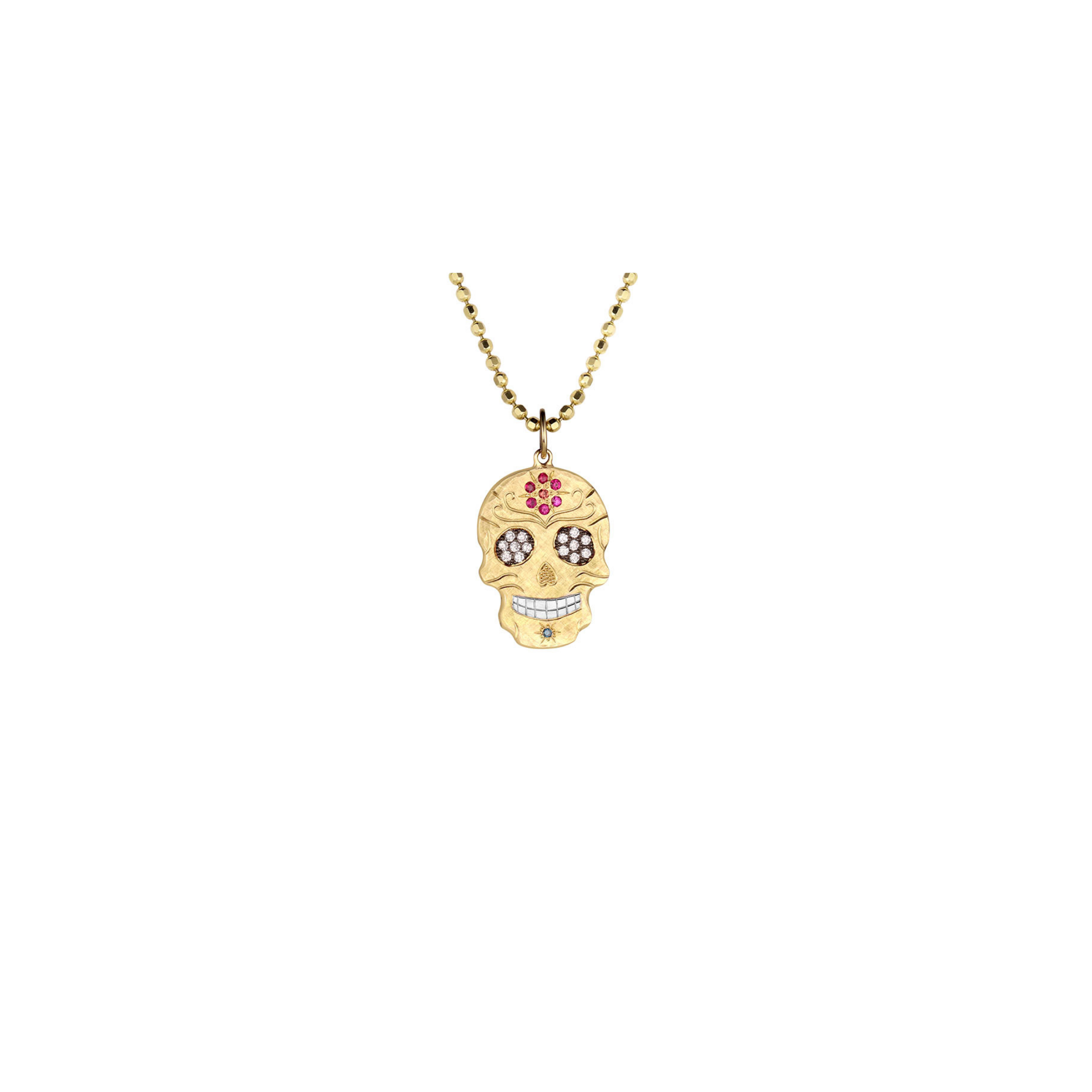 Gold skull pendant necklace on a white background