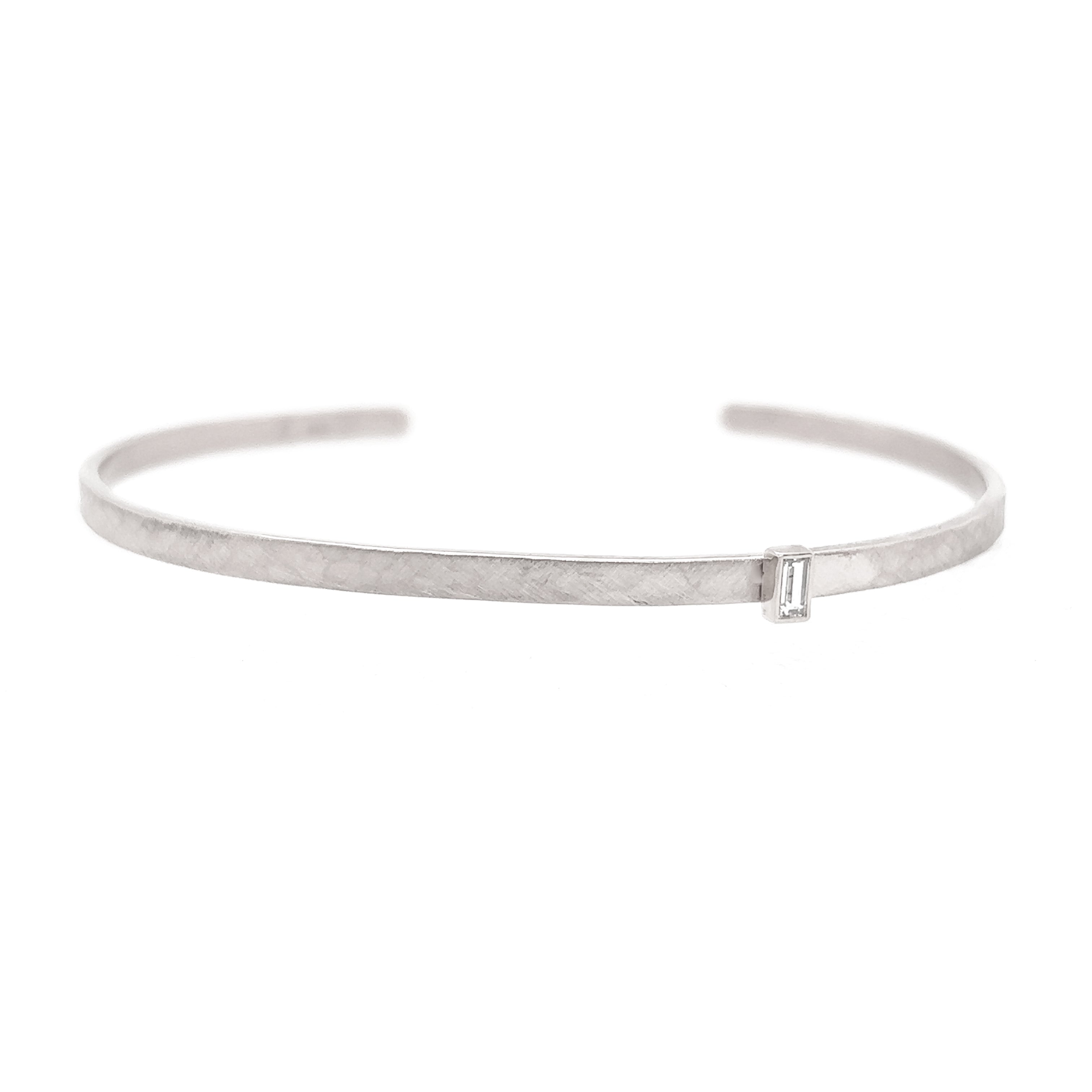 14k white gold hammered open cuff with baguette white diamond on white background