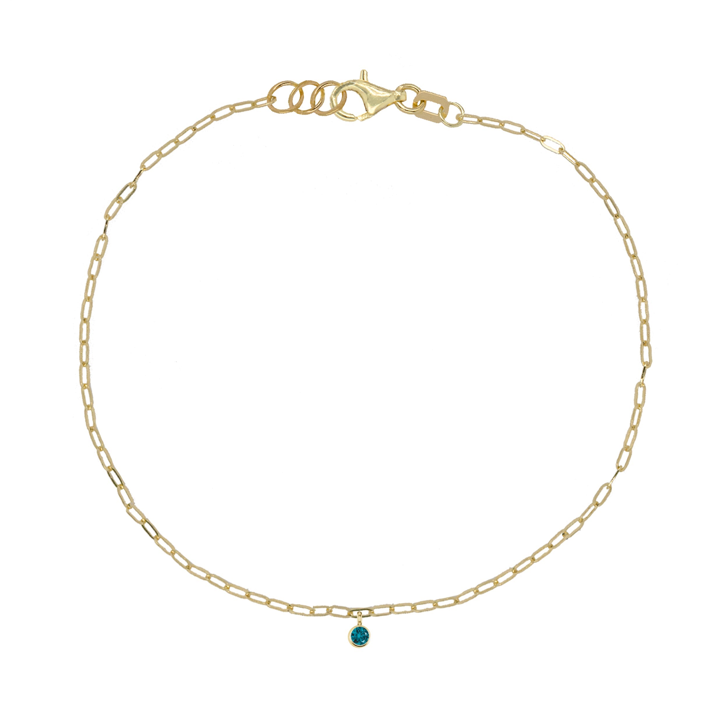 14k yellow gold paperclip chain bracelet with bezel set gemstone charm on white background