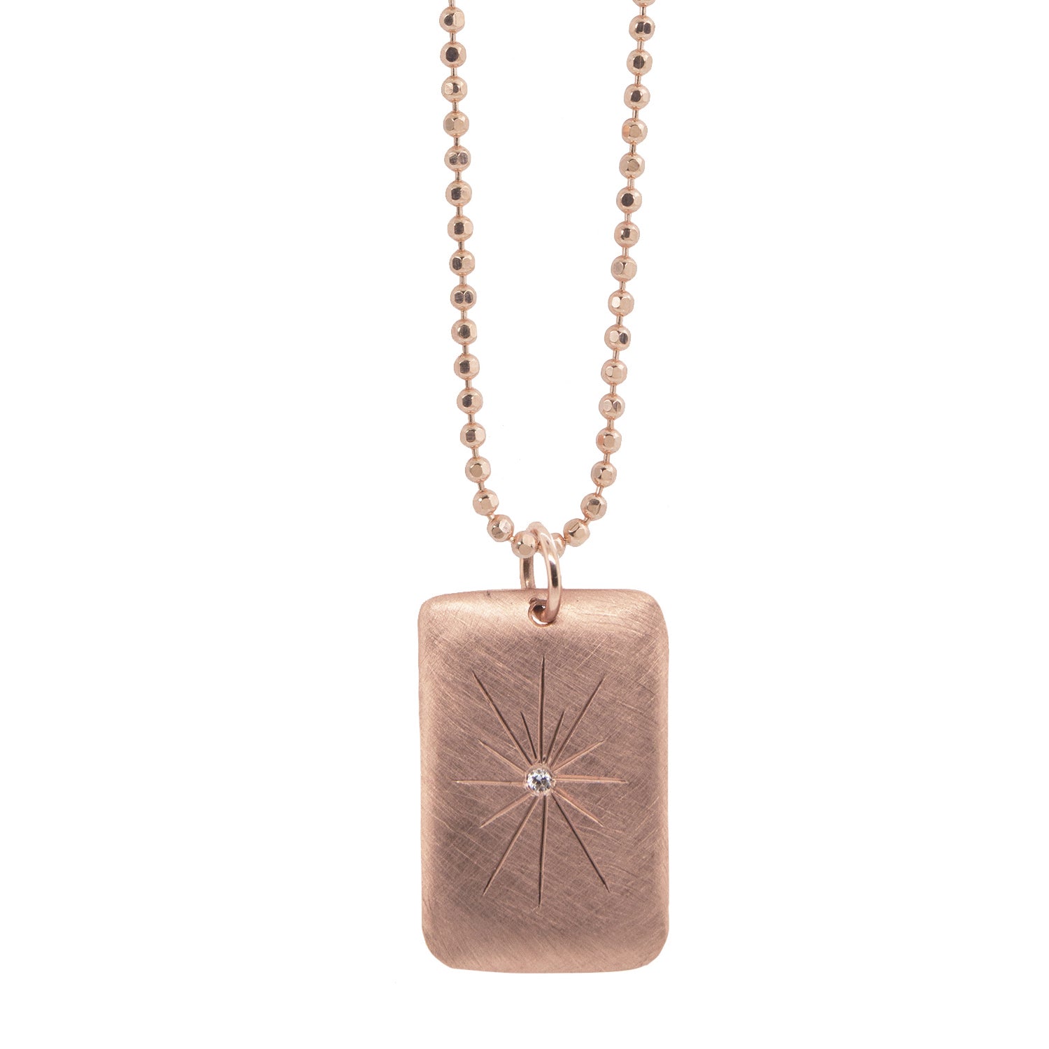 14k rose gold satin finished rectangle pendant necklace with starburst design  with white diamond on diamond cut ball chain on a white background