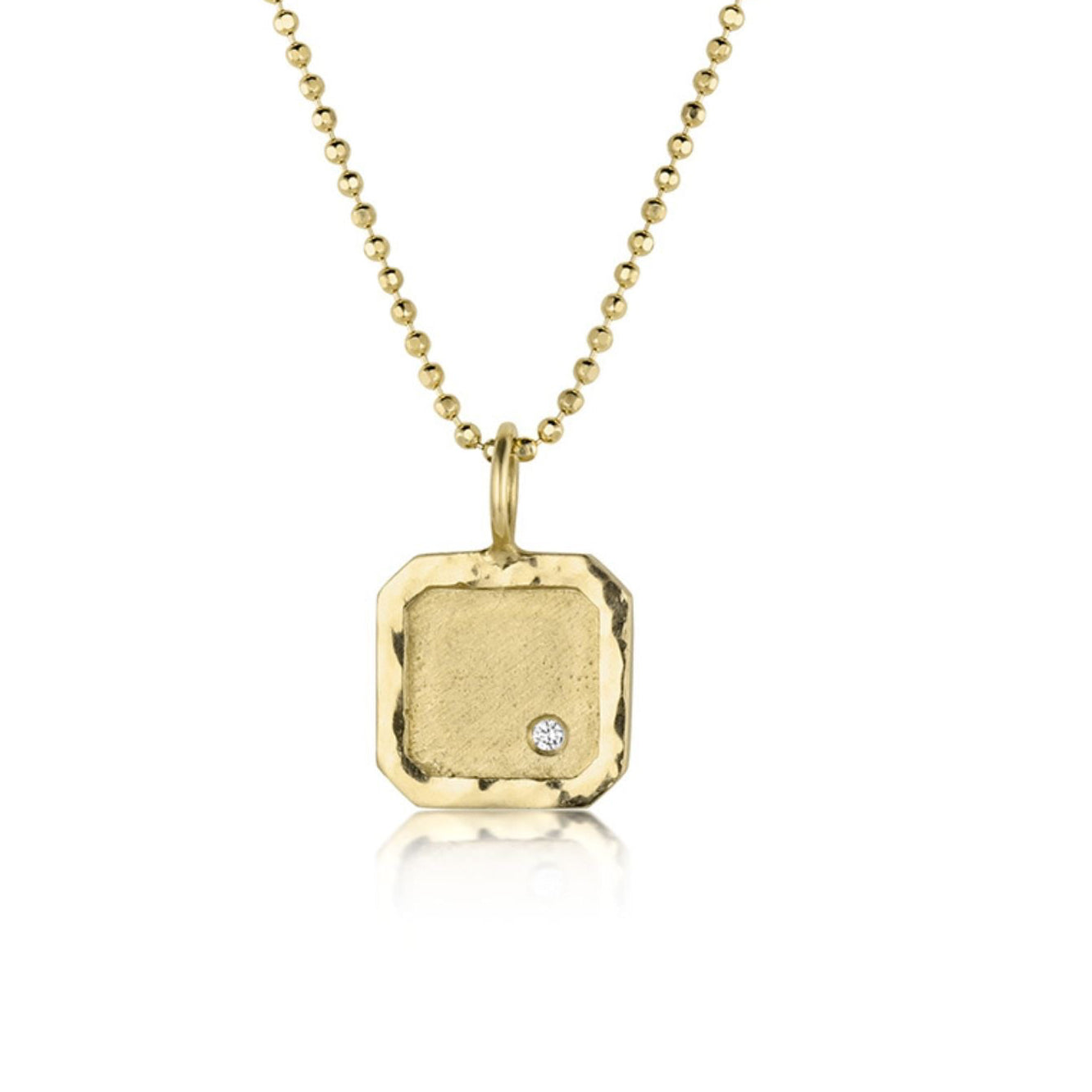 14k yellow Gold square pendant with an offset white diamond on a diamond cut ball chain on a white background