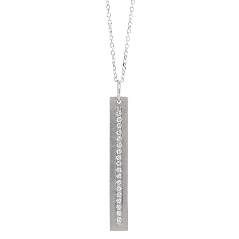 14k white gold vertical bar pendant with paved set white diamonds on diamond cut rolo chain on a white background