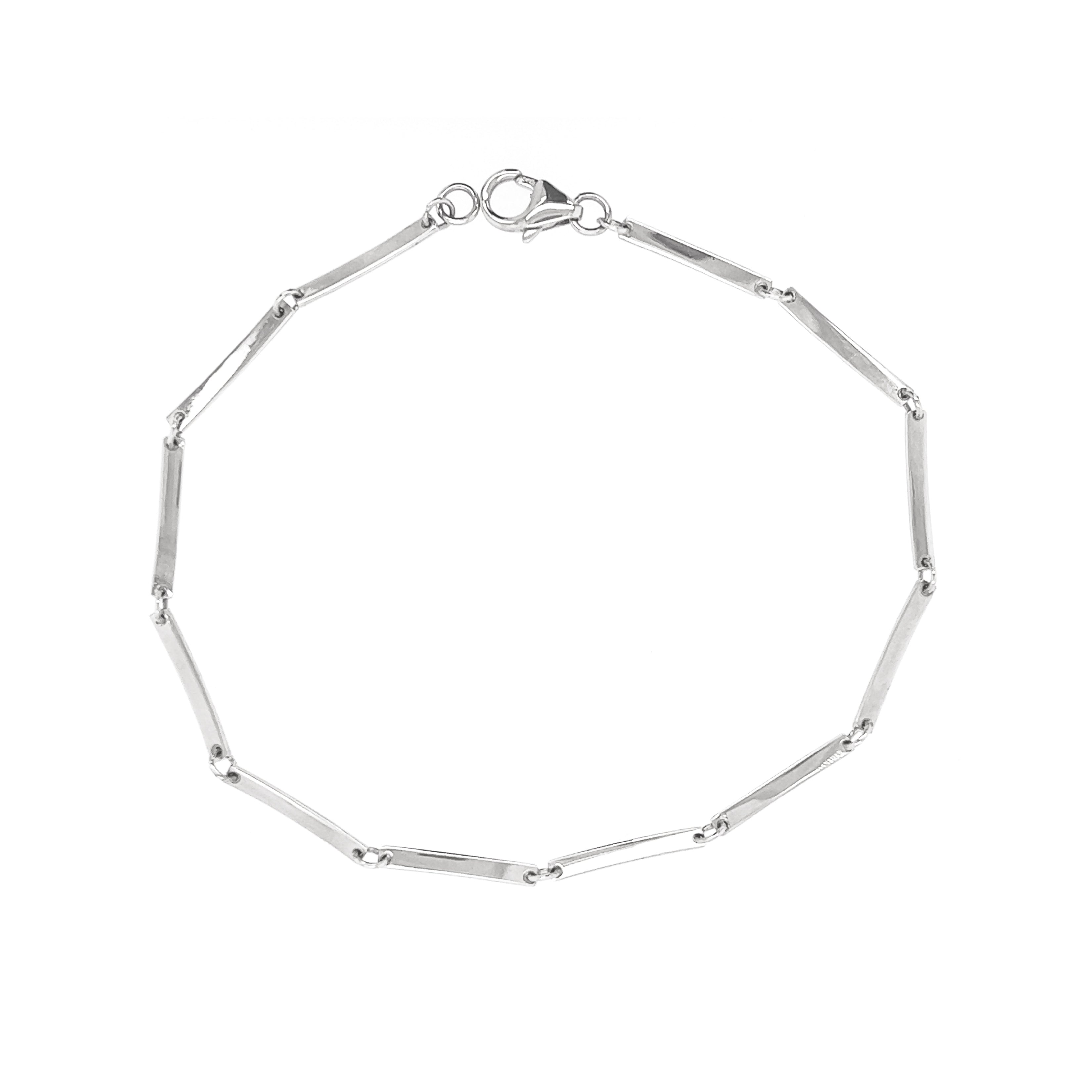 14k white gold flat bar link bracelet on white background