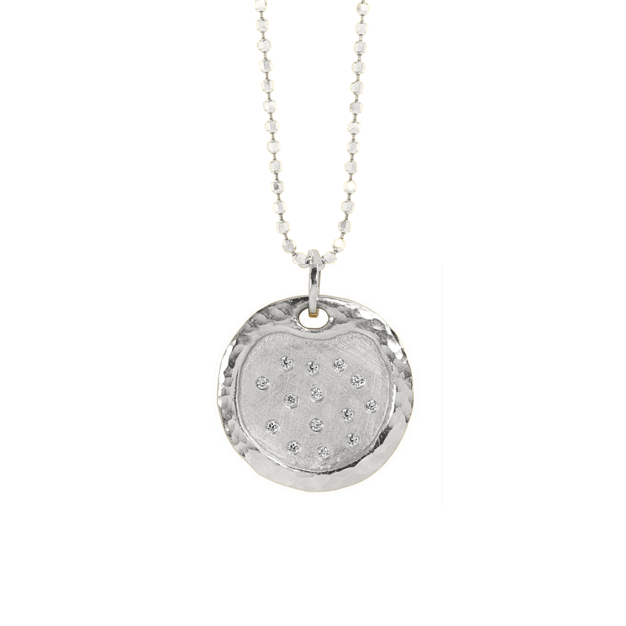 14k white gold round pendant featuring hammered texture border with burnish set white diamonds hanging on diamond cut ball chain shown on white background.