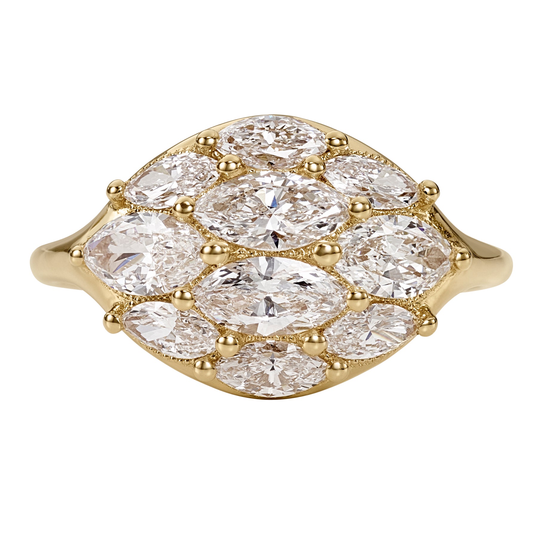 Gold ring with clear gemstones on a white background