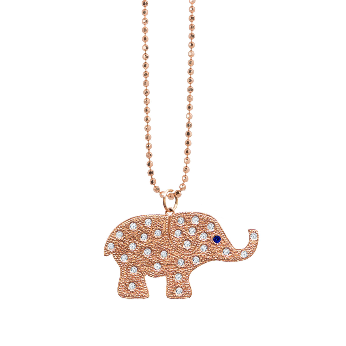 14k gold elephant pendant with white diamonds and blue sapphire on white background