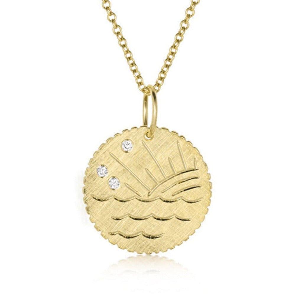 14k Gold necklace featuring a round diamond disk pendant with hand engraved ocean waves and sun design accented with 3 white diamonds on a white background