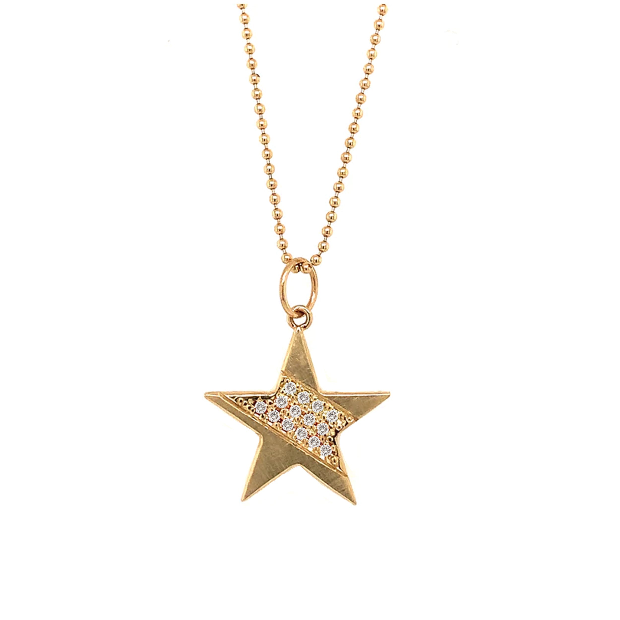 14k yellow gold star-shaped pendant with paved set white diamonds on a ball chain on a white background