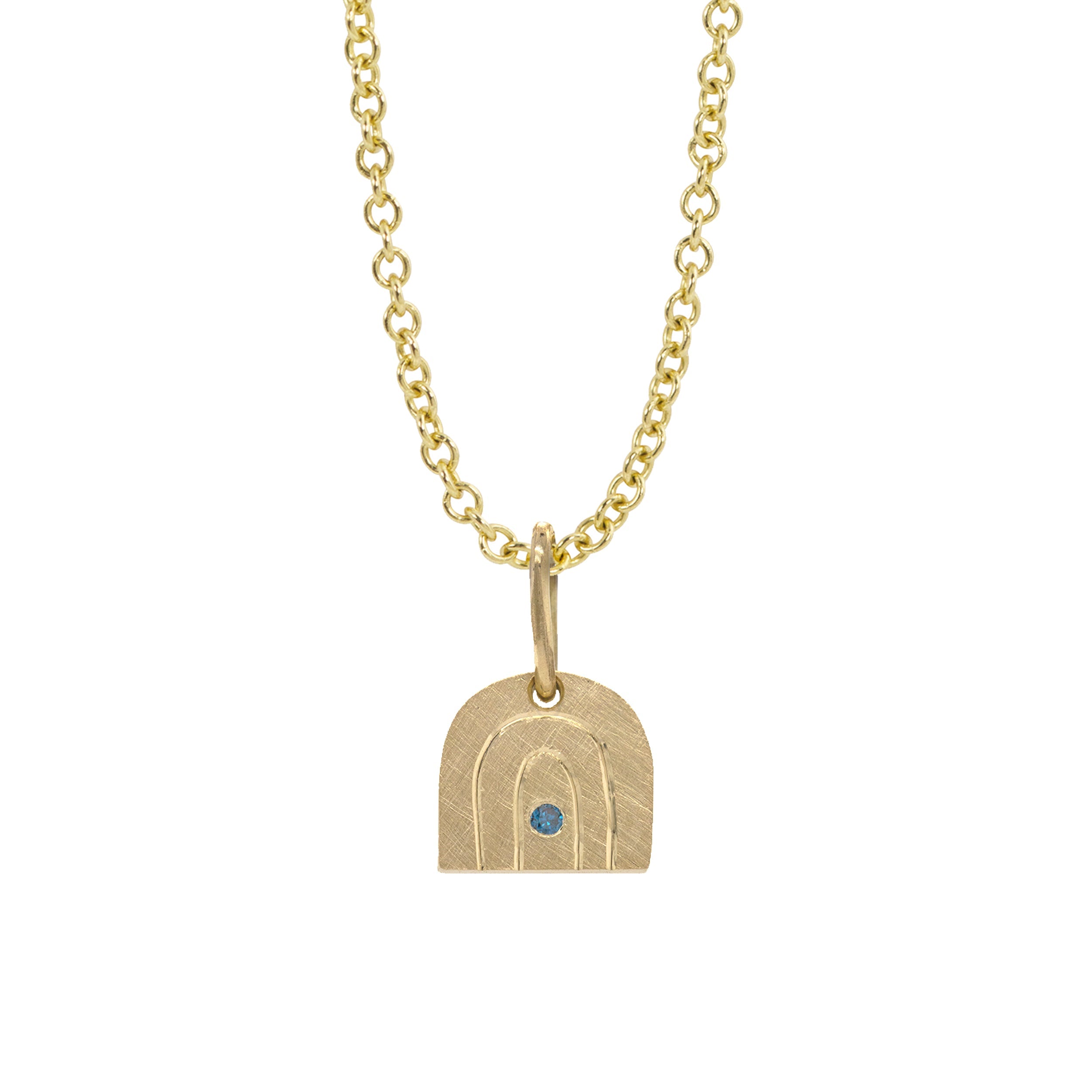 14k yellow gold rainbow pendant with a colored gemstone in the center on a rolo chain on a white background