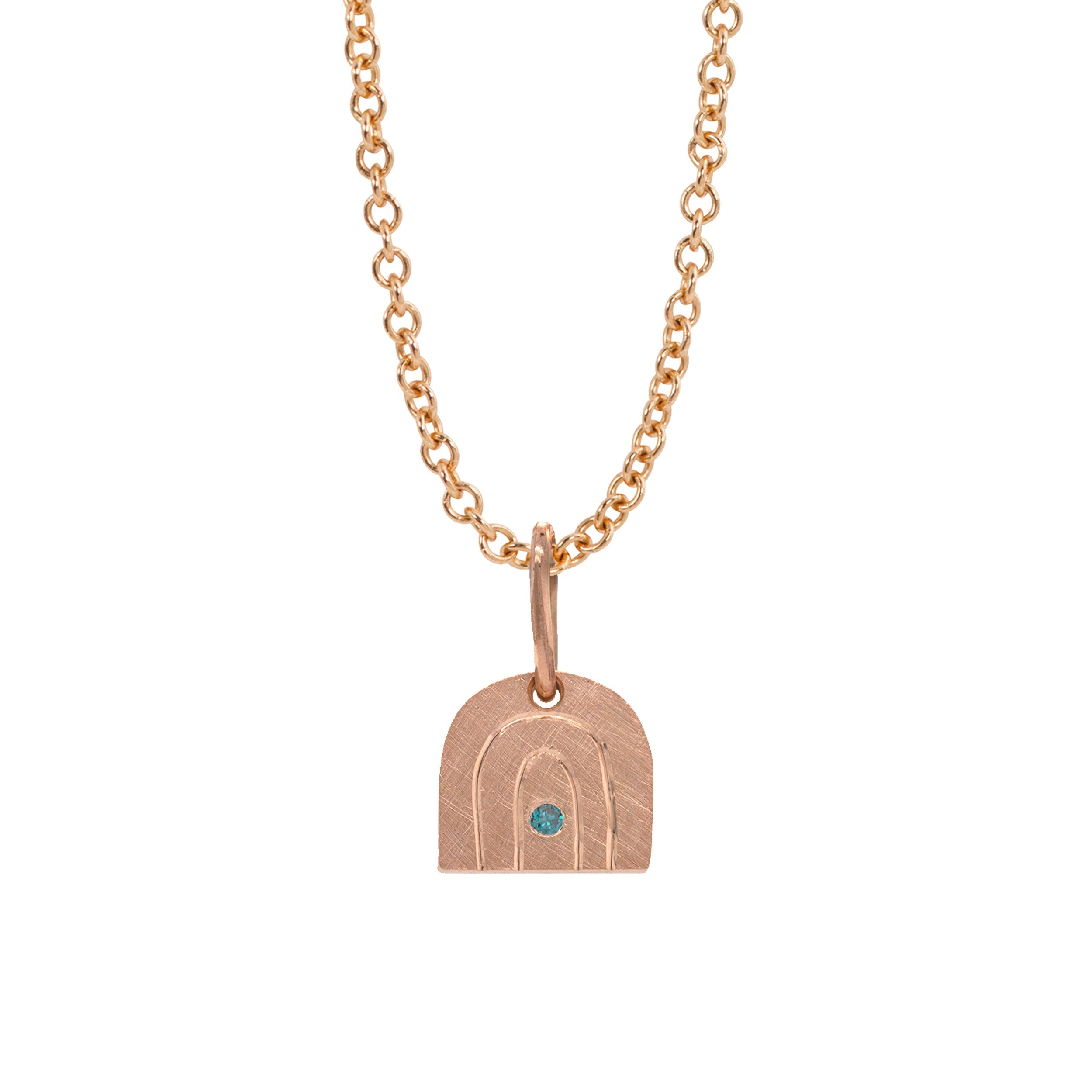 14k rose gold rainbow pendant with a colored gemstone in the center on a rolo chain on a white background