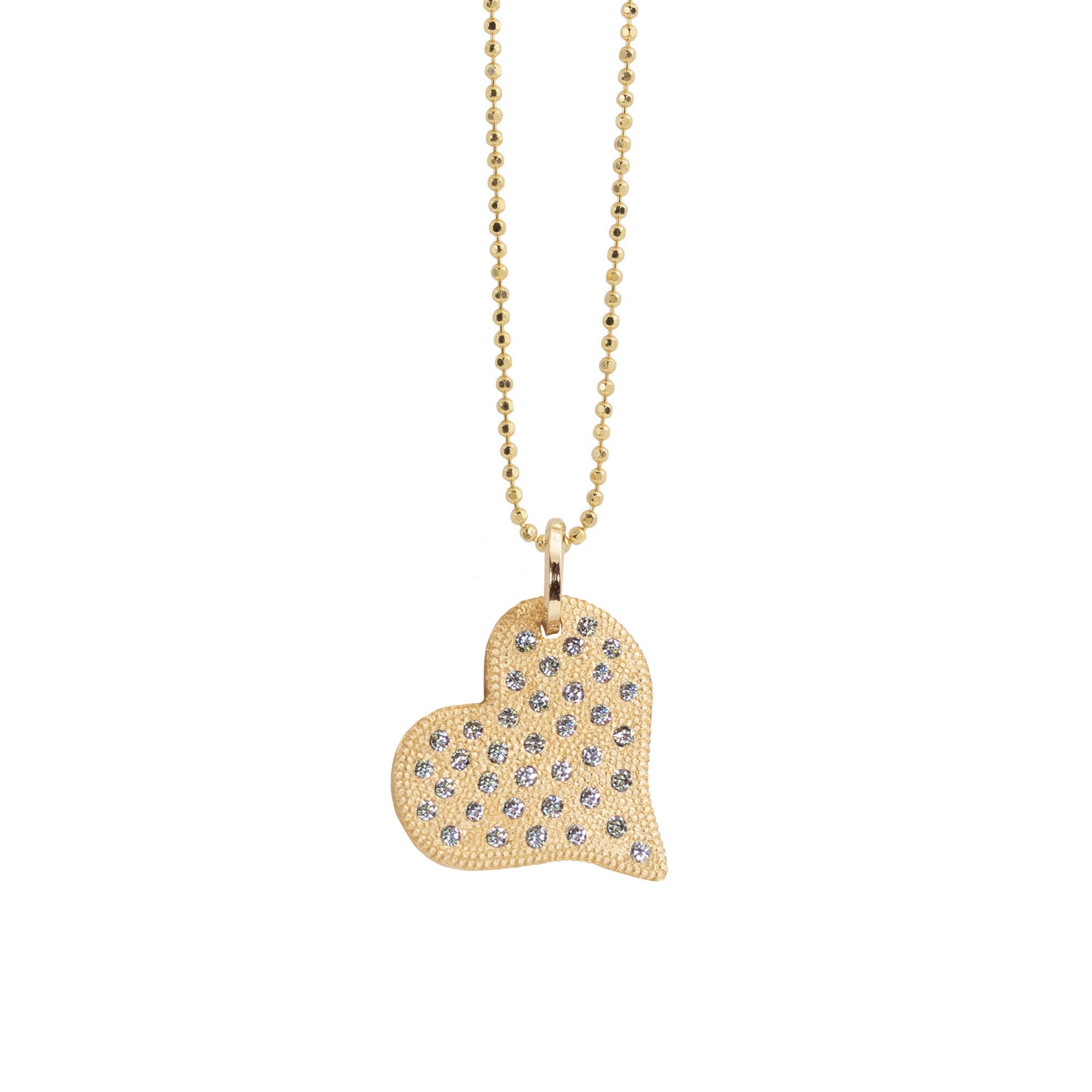 14k yellow gold heart pendant with beaded texture and scattered white diamonds on a diamond cut ball chain on a white background