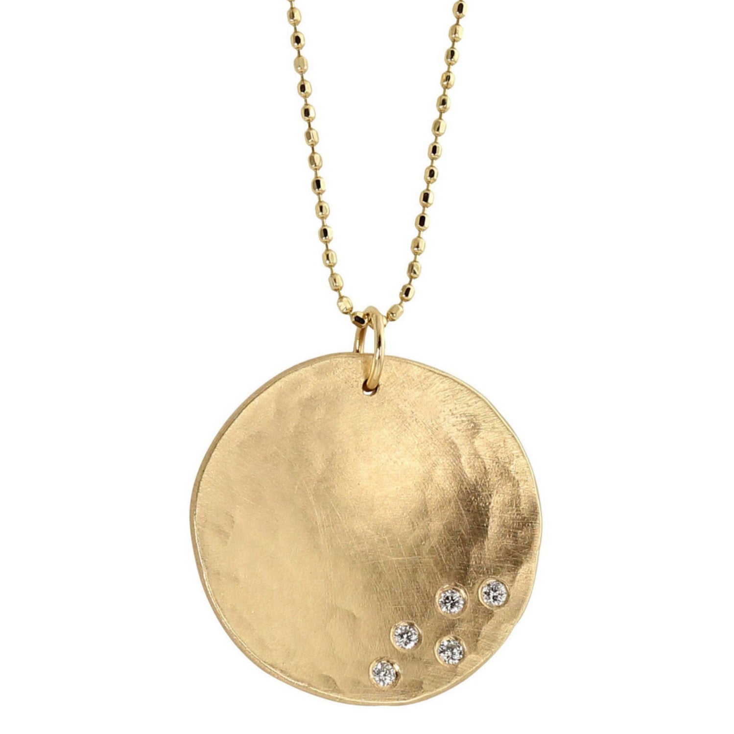 14k yellow gold hammered round pendant with five white diamonds on a white background