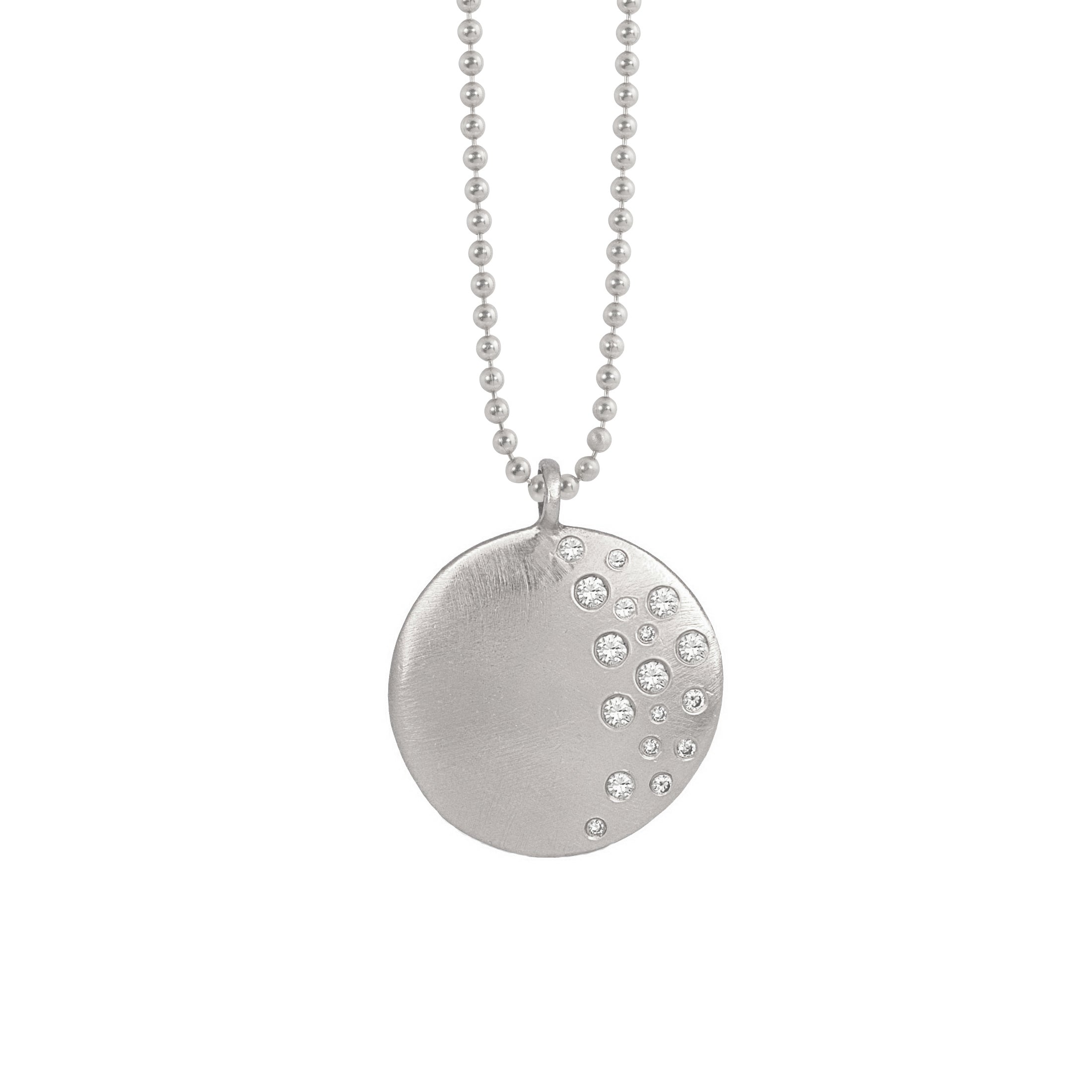 14k white gold round pendant featuring  scattered white diamonds on a ball chain on a white background