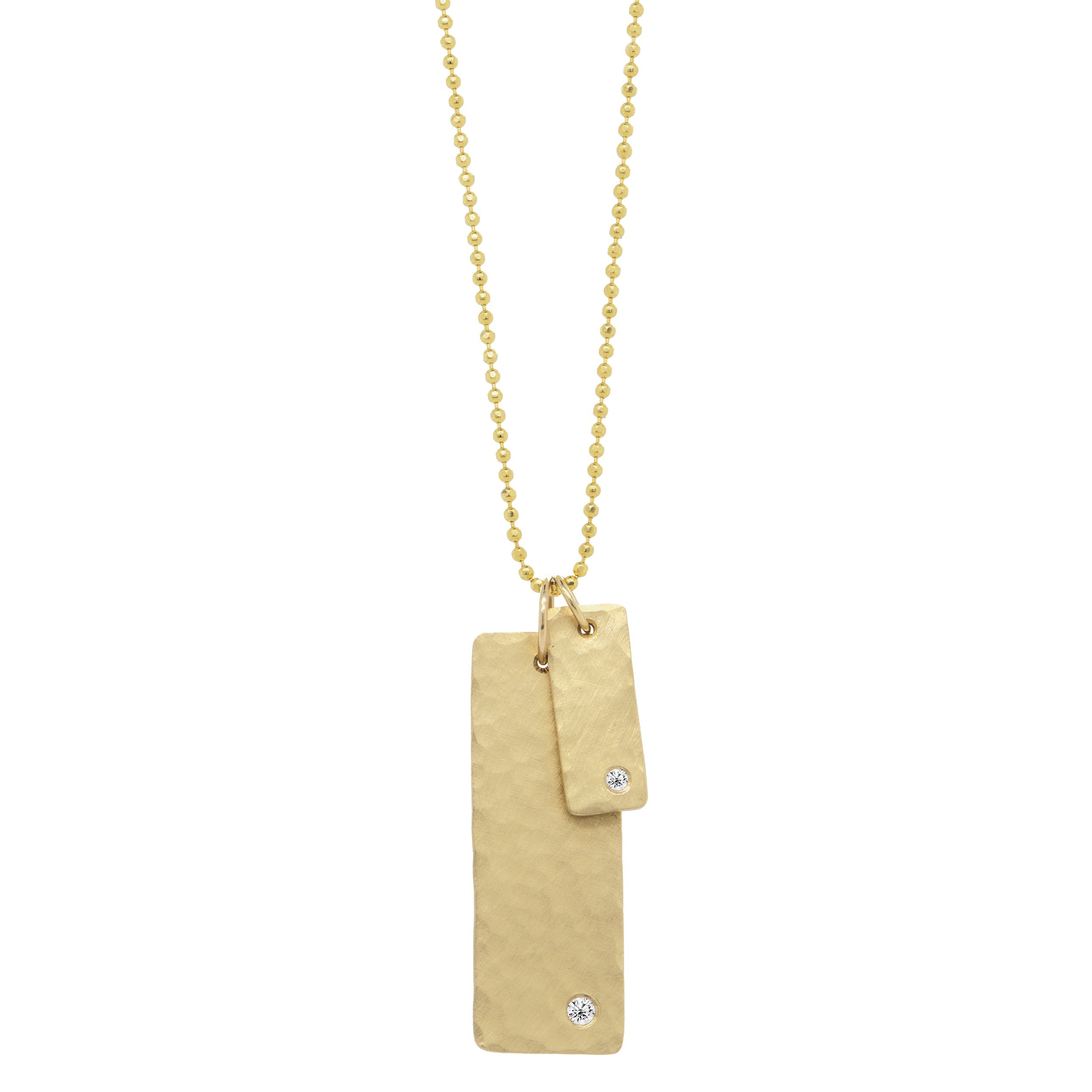 Layered 14k yellow gold elongated rectanglular hammer texture pendants sized baby and medium with single stone diamond accent hanging from dainty ball chain on white background