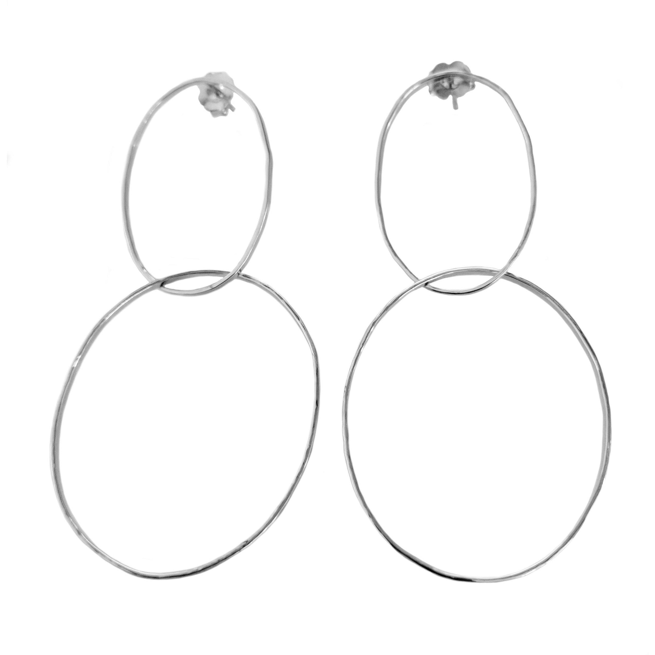 14k white gold double intersecting hoop earrings with posts shown on white background