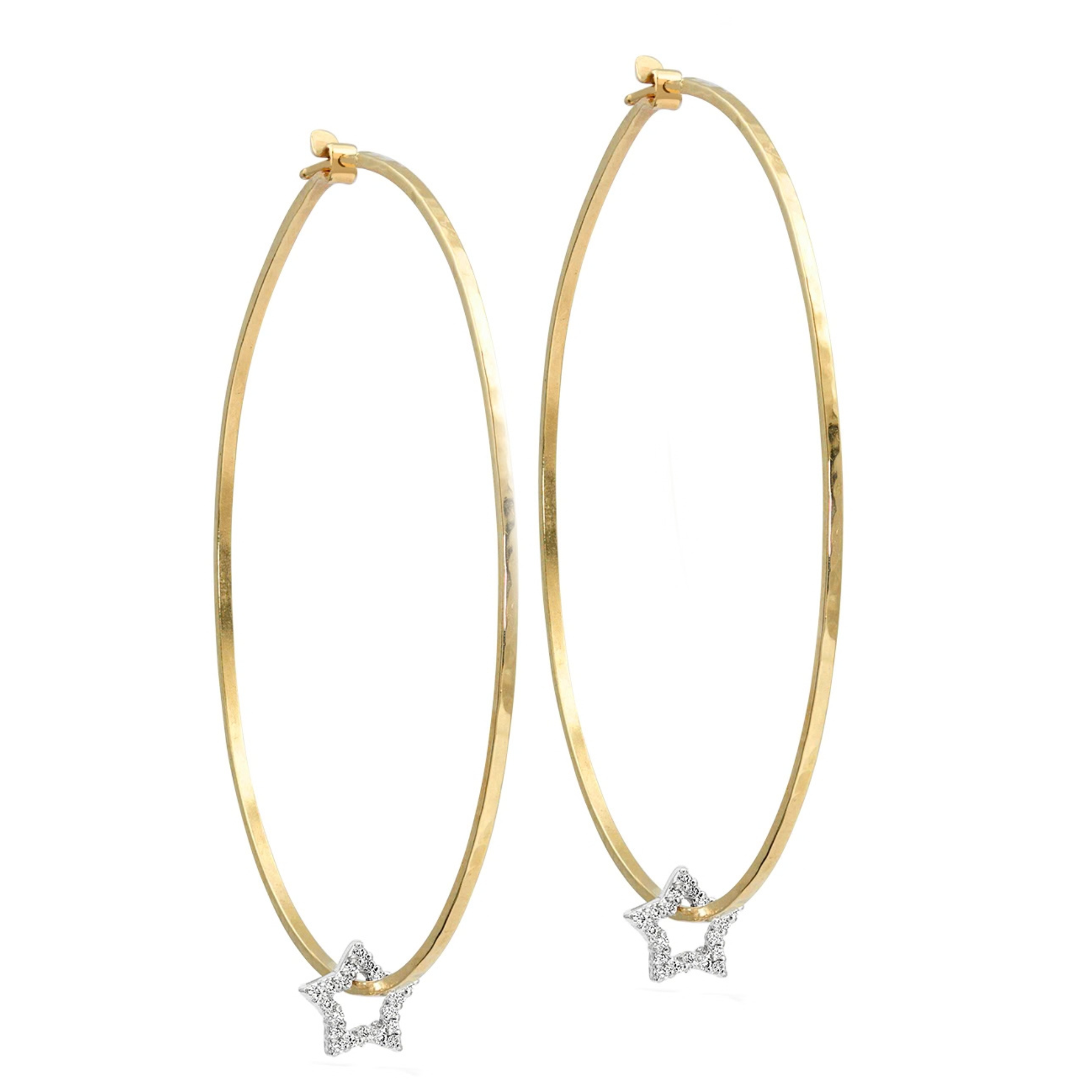 14k yellow gold hammered wire hoops with pave set white diamond star charms on white background