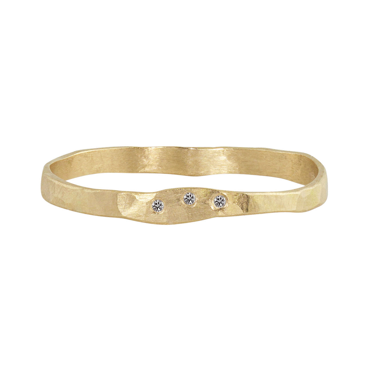 14k yellow gold hammered stackable ring with three white diamonds on a white background
