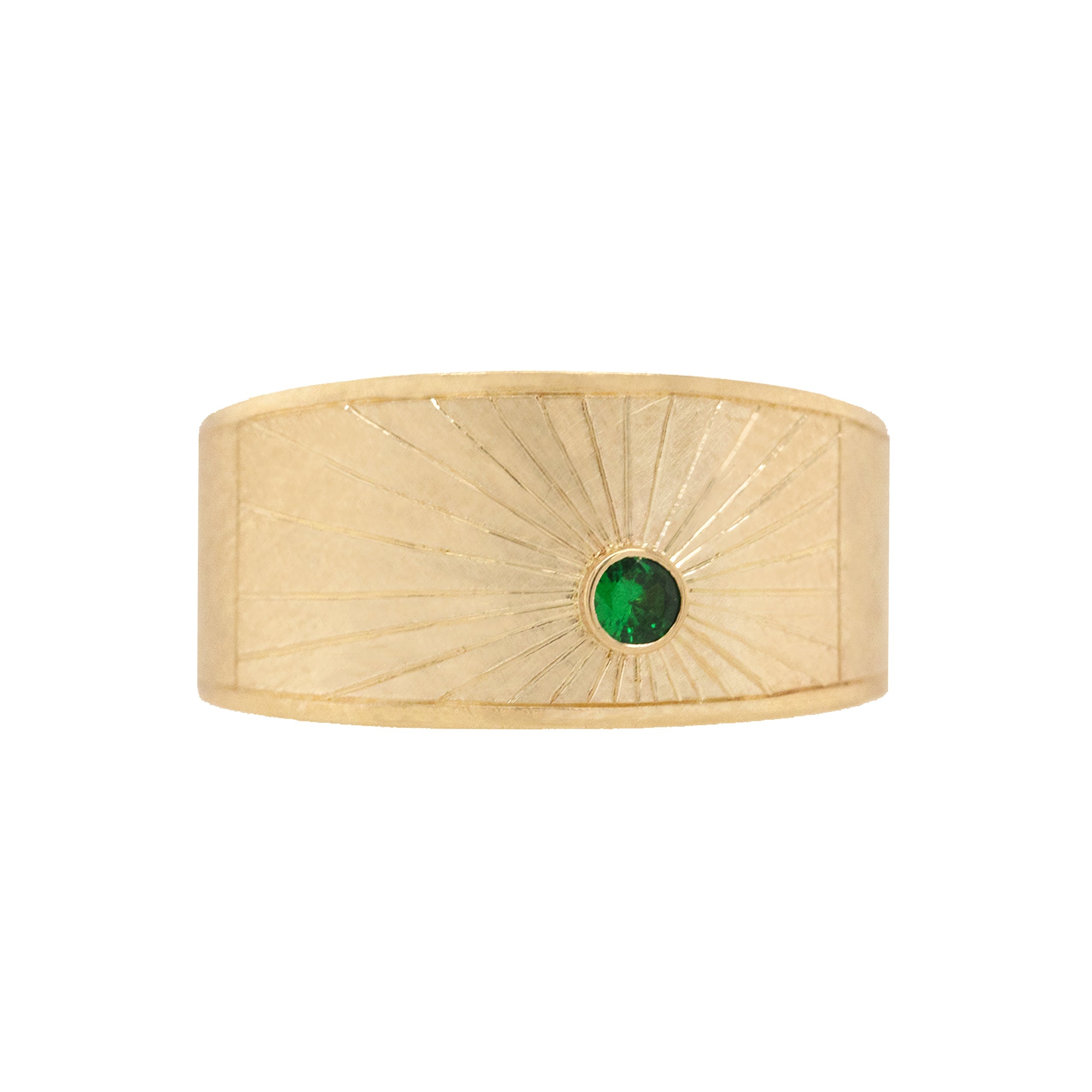 14k yellow gold wide band with hand etched sunburst and green tsavorite on white background