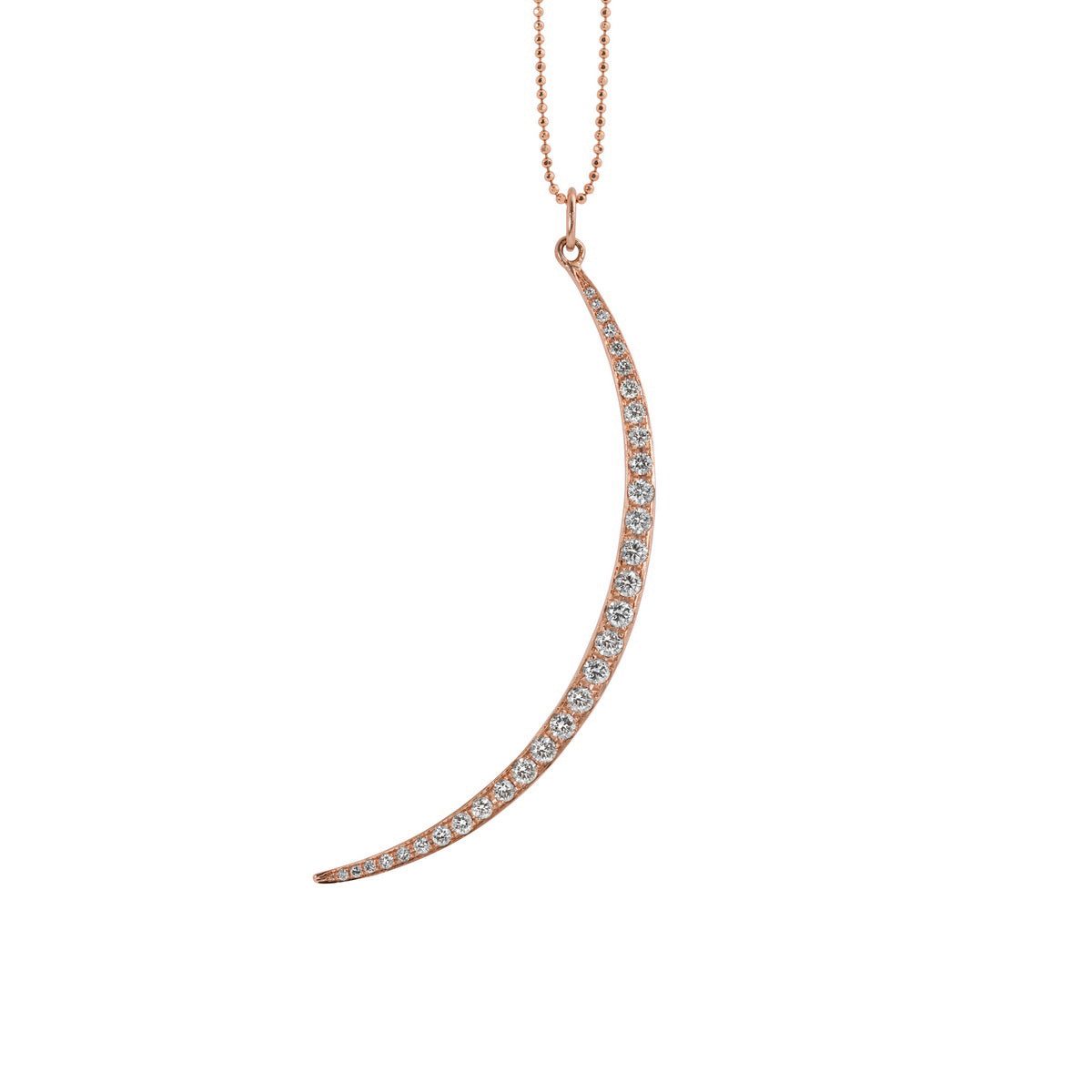 14k rose gold curved crescent moon pendant with paved set white diamonds on a white background