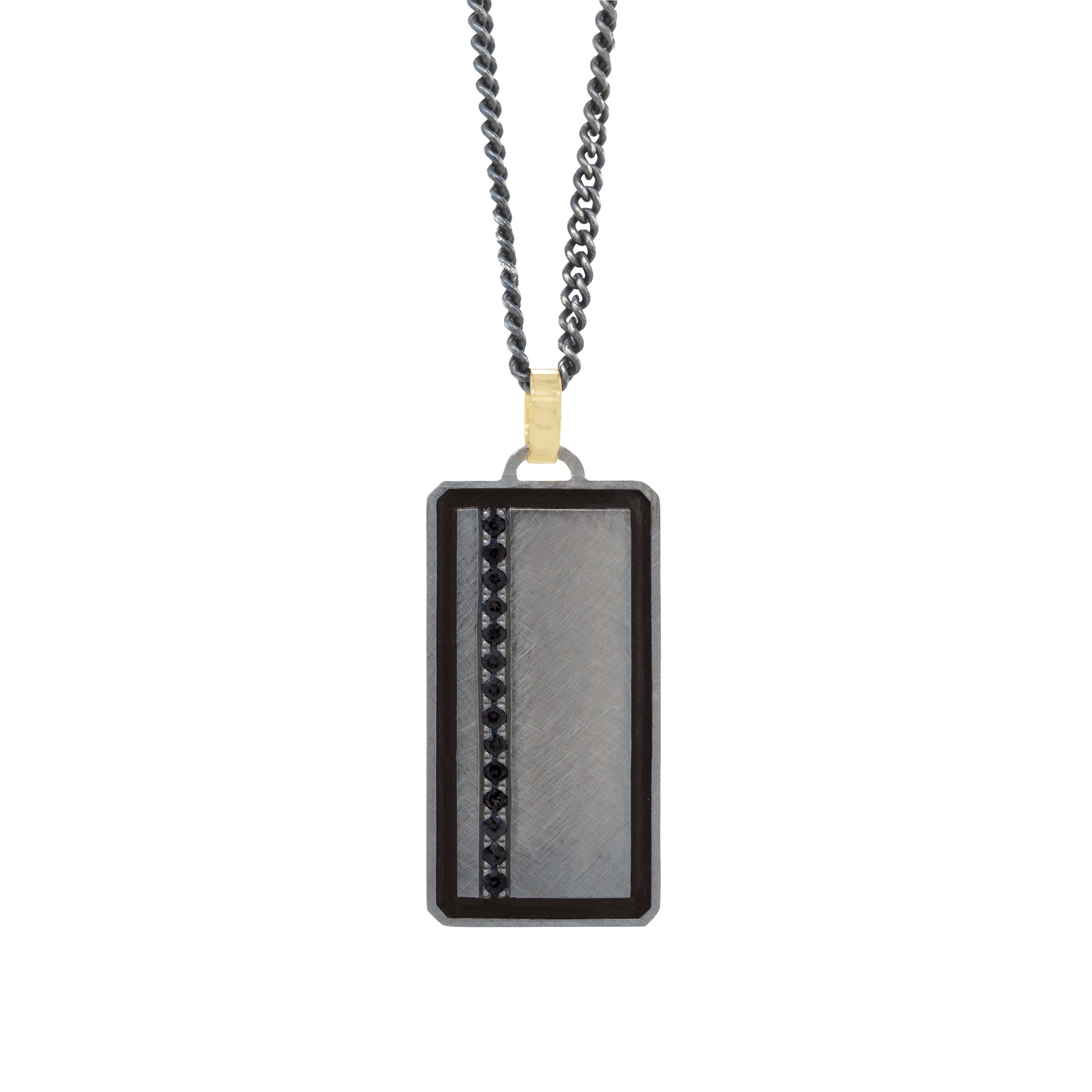 blackened sterling silver rectangular pendant with colored enamel and colored gemstone line with 14k yellow gold jump ring on white background