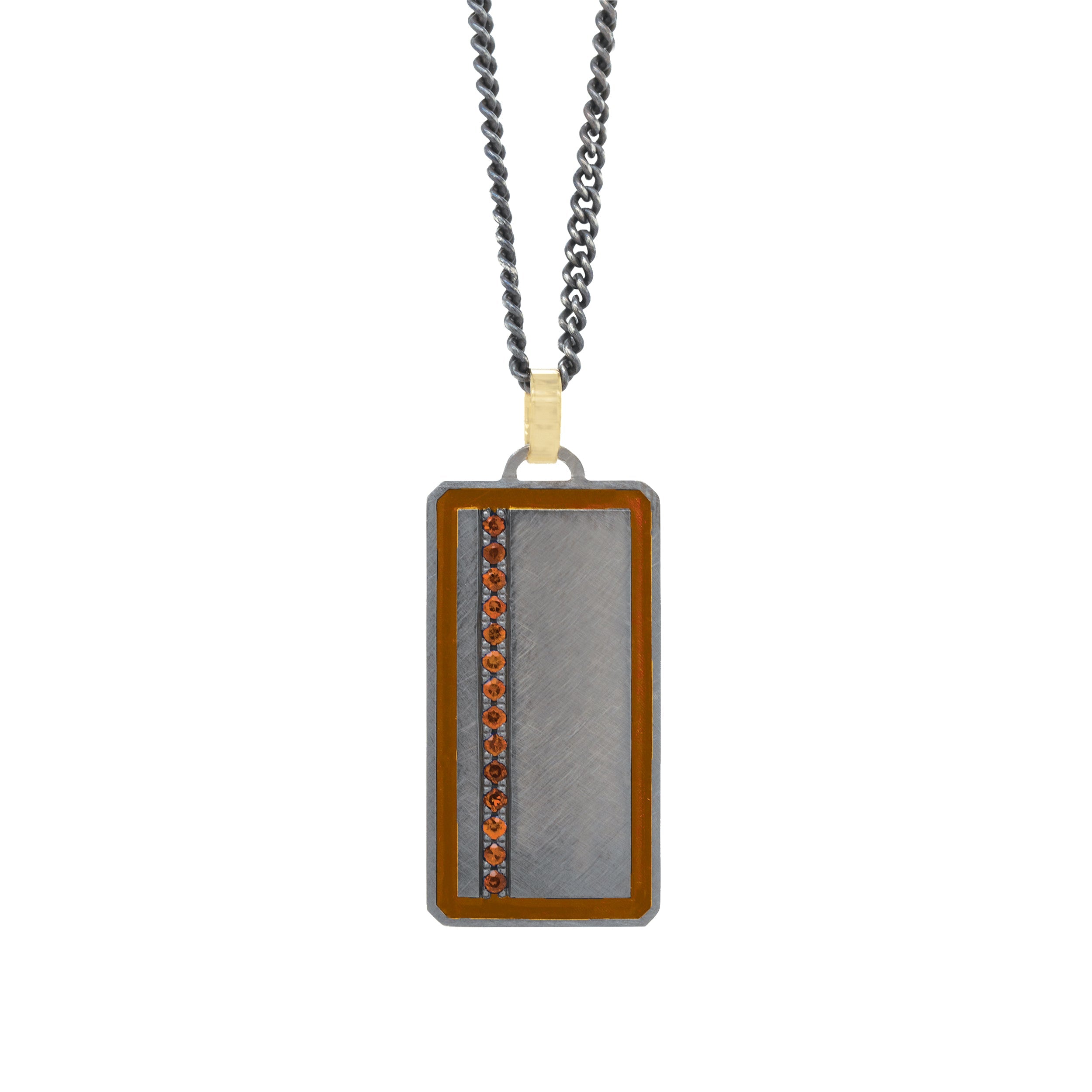 blackened sterling silver rectangular pendant with colored enamel and colored gemstone line with 14k yellow gold jump ring on white background