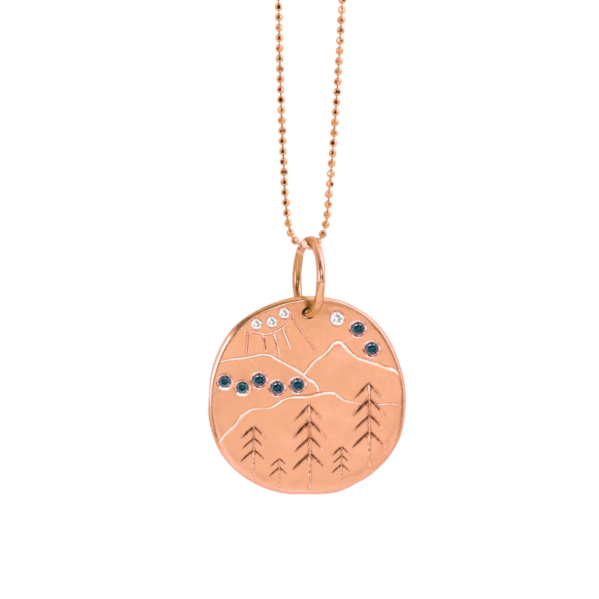 Blue Ridge Etched Mountain medallion with white diamonds and blue sapphires by julez bryant on white background