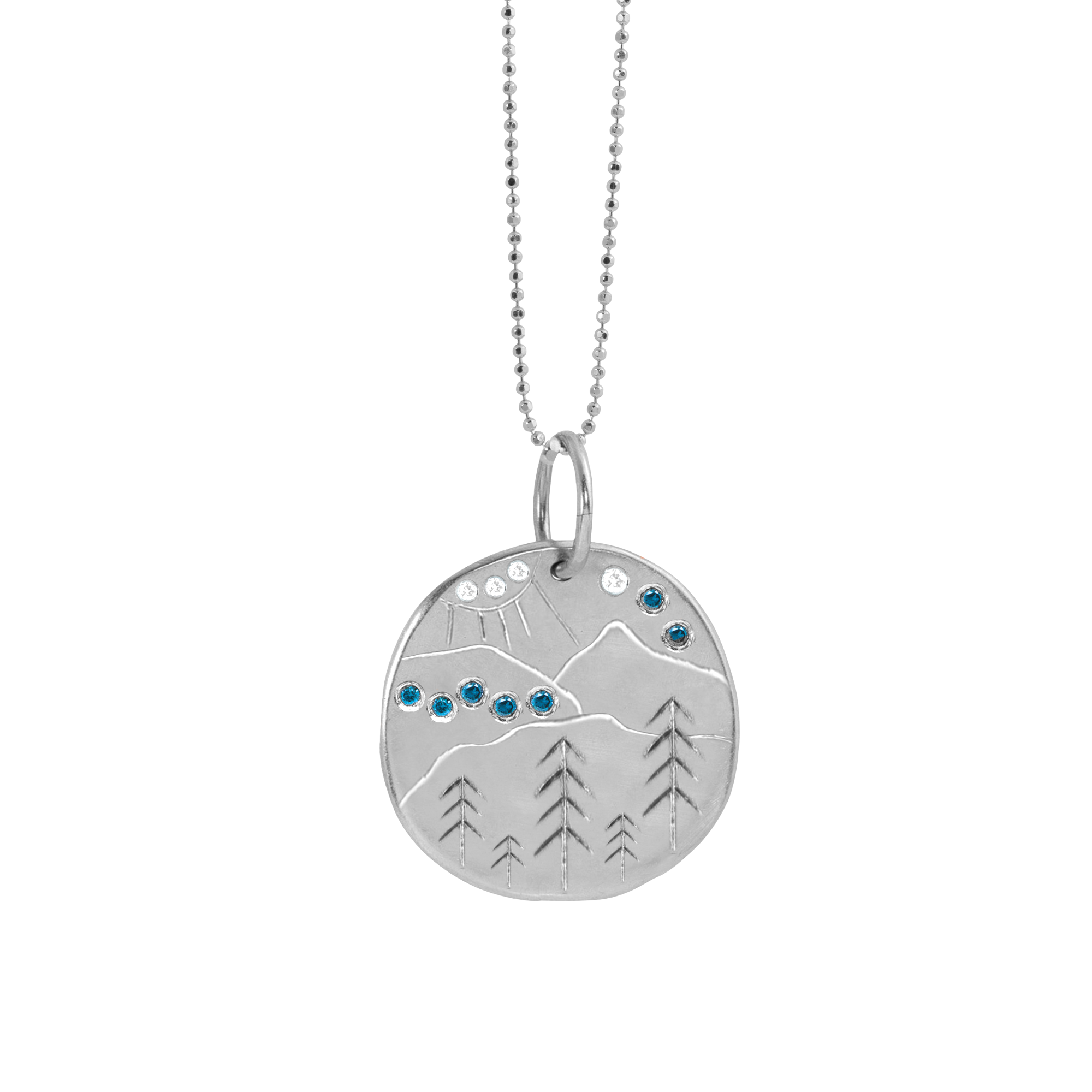 Blue Ridge Etched Mountain medallion with white diamonds and blue sapphires by julez bryant on white background