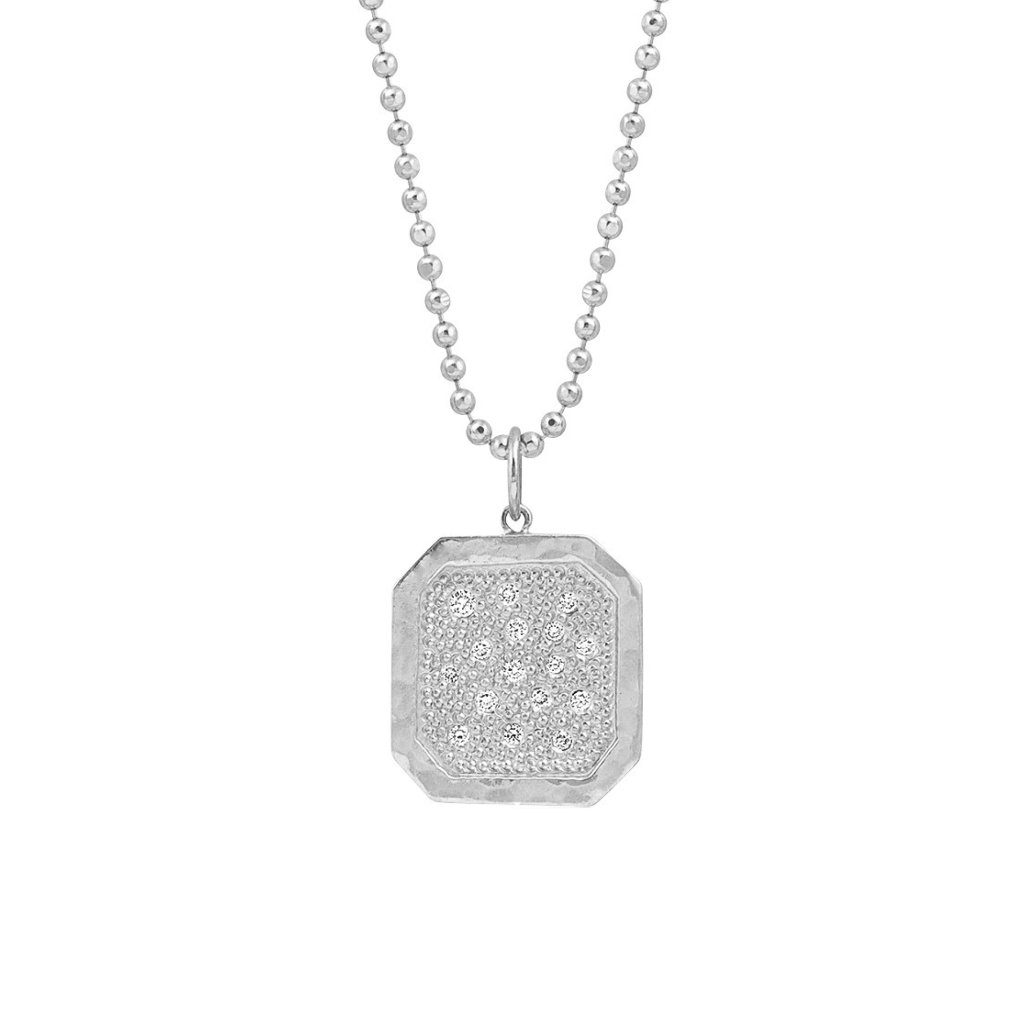 14k white gold square dogtag pendant with beaded texture and scattered white  diamonds with shiny border on white background