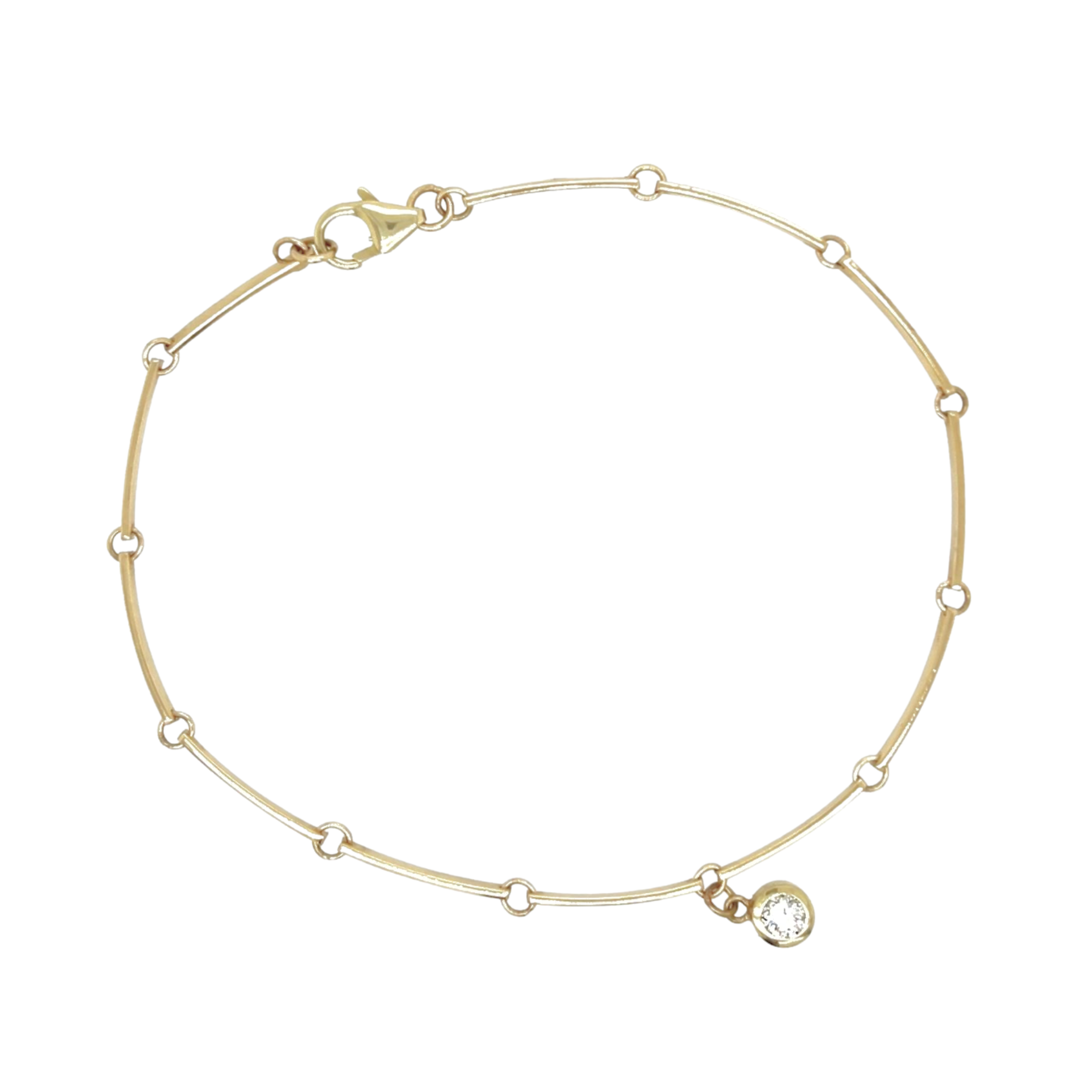 14k yellow gold flat bar link bracelet with bezel set white diamond charm on white background