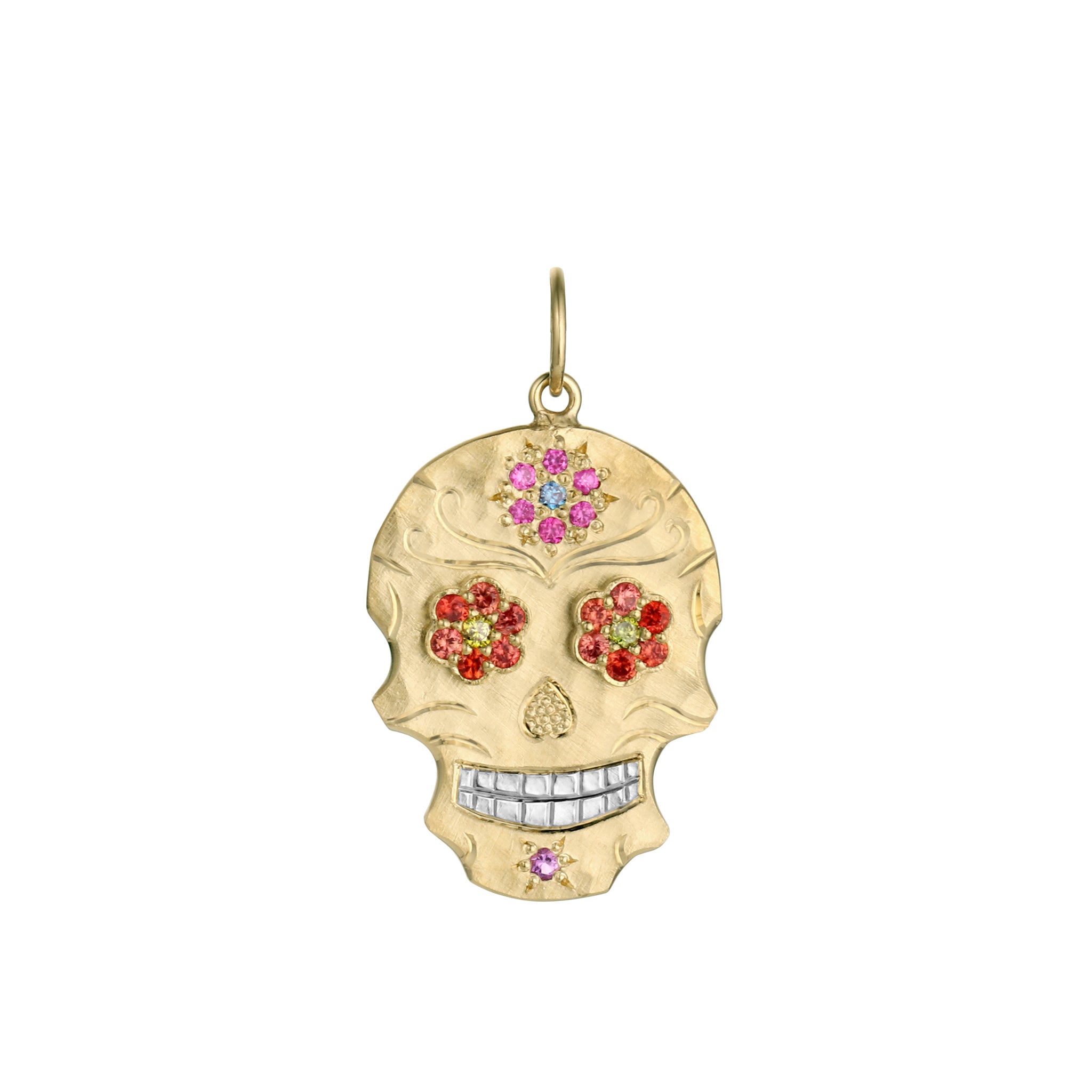 Small 14k gold skull shaped pendant necklace with orange and yellow bezel set gemstone floral eyes, pink and blue bead set pink and blue flower on forehead, hand engraved details and shiny rhodium plated teeth pendant only shown on a white background.