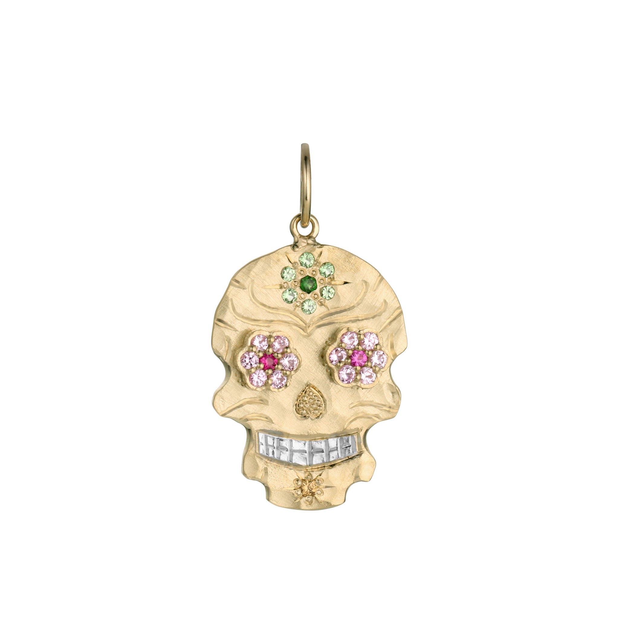 Small 14k gold skull shaped pendant necklace with multi tone pink bezel set gemstone floral eyes, bead set light and dark green flower on forehead, yellow stone on chin, hand engraved details and shiny rhodium plated teeth pendant only on a white background.