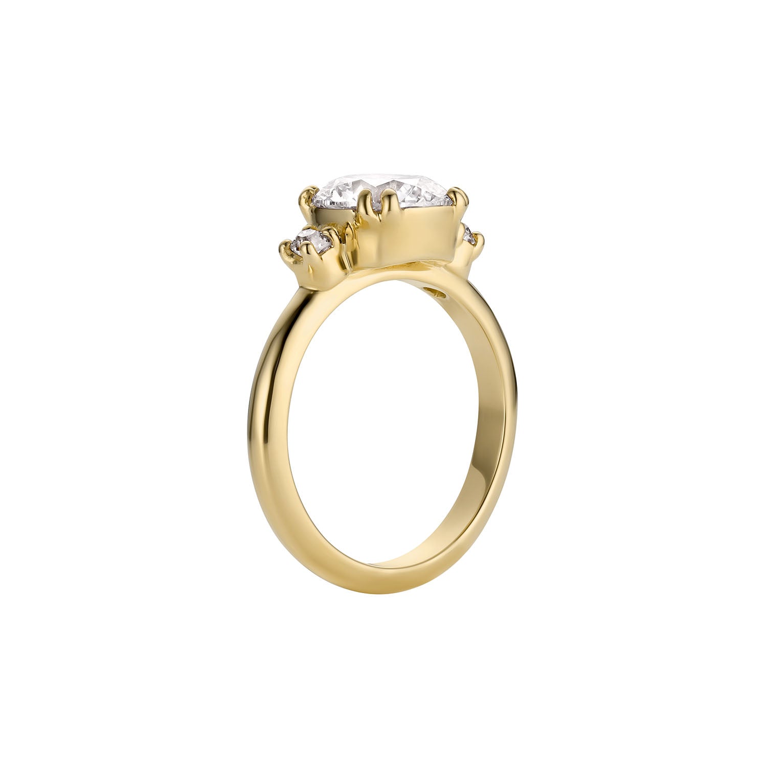 Side view of 14k Gold ring with three diamonds in sturdy prong setting on a white background