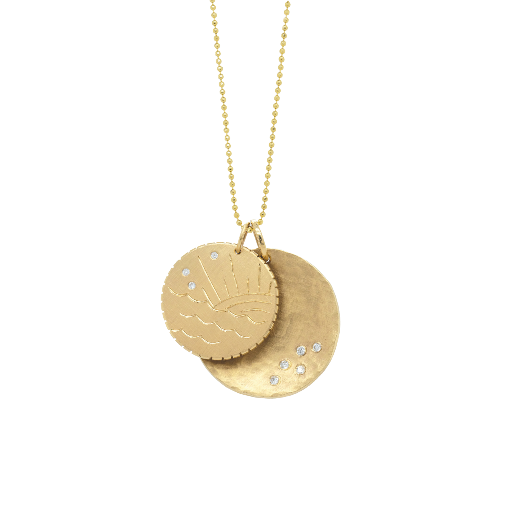 14k yellow gold round diamond disk pendants necklace featuring hand engraved ocean waves and sun ray design scattered white diamonds in the sky and notched detail around edge shown layered with larger concave diamond disk medallion hanging from ball chain on white background
