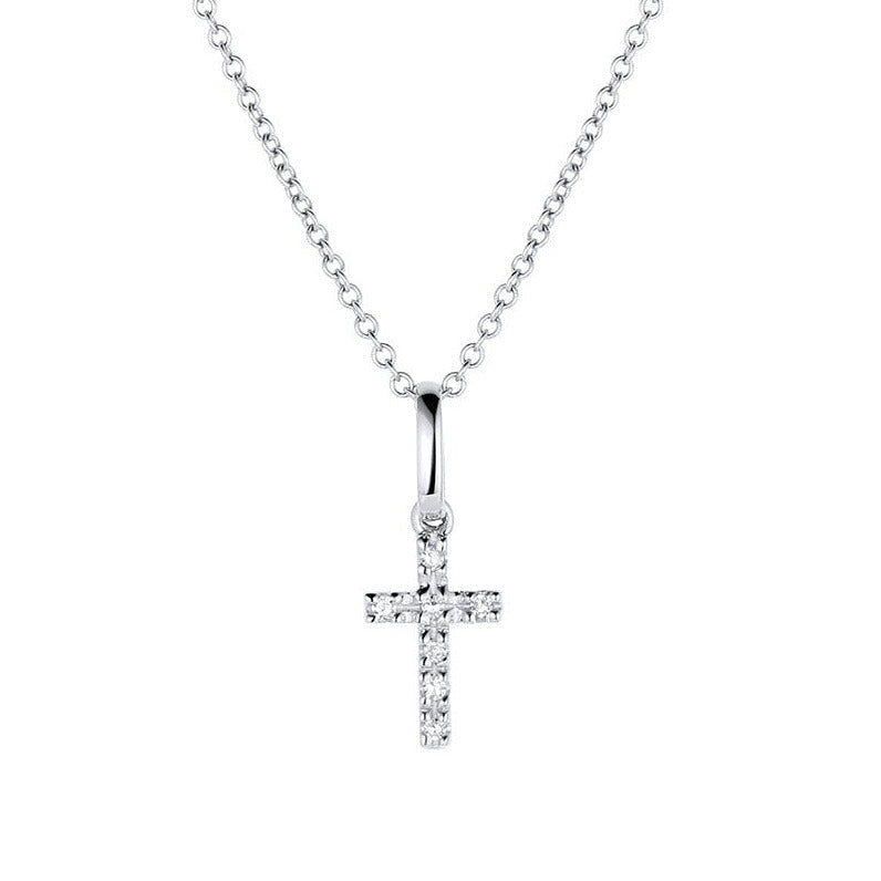 14k white gold pave diamond cross pendant necklace on a white background