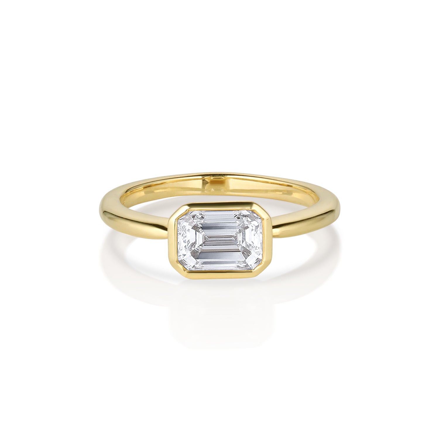 Asscher cut yellow gold solitaire ring with a bezel setting shown on a white background