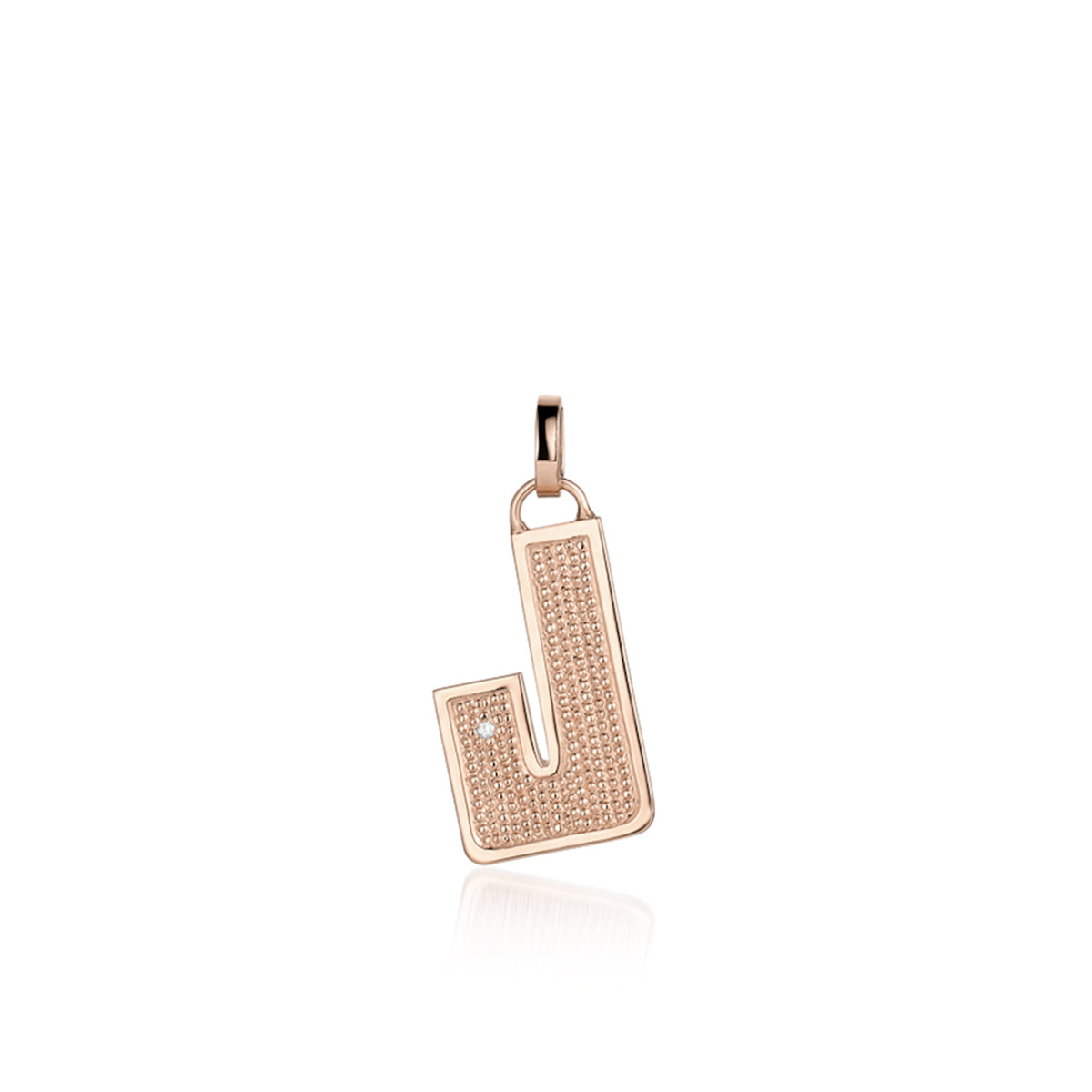 14k rose Gold pendant shaped like the letter "J"  features single white diamond accent with  textured surface. Pendant shown on white background.