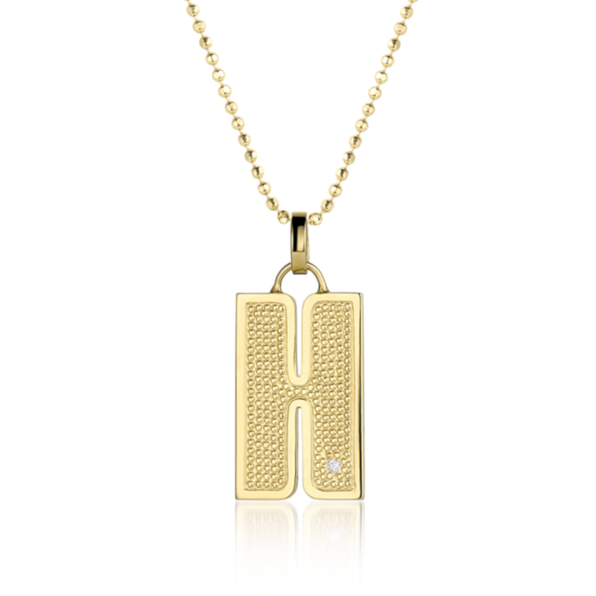 14k Gold necklace with a pendant shaped like the letter 'H' Single white diamond accent with beaded texture.