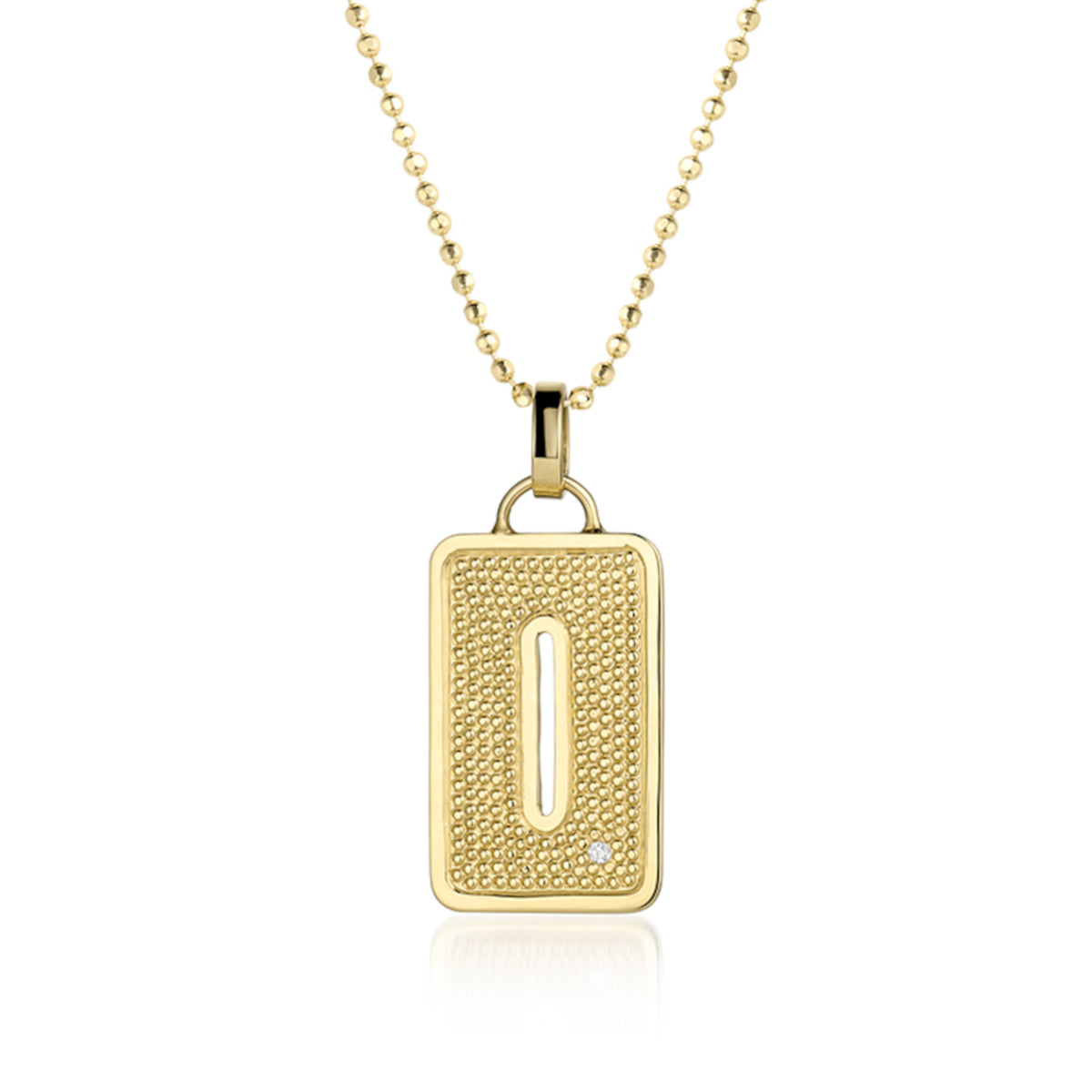 14k yellow Gold pendant shaped like the letter O  features single white diamond accent with  textured surface. Pendant on diamond ball chain, shown on white background.