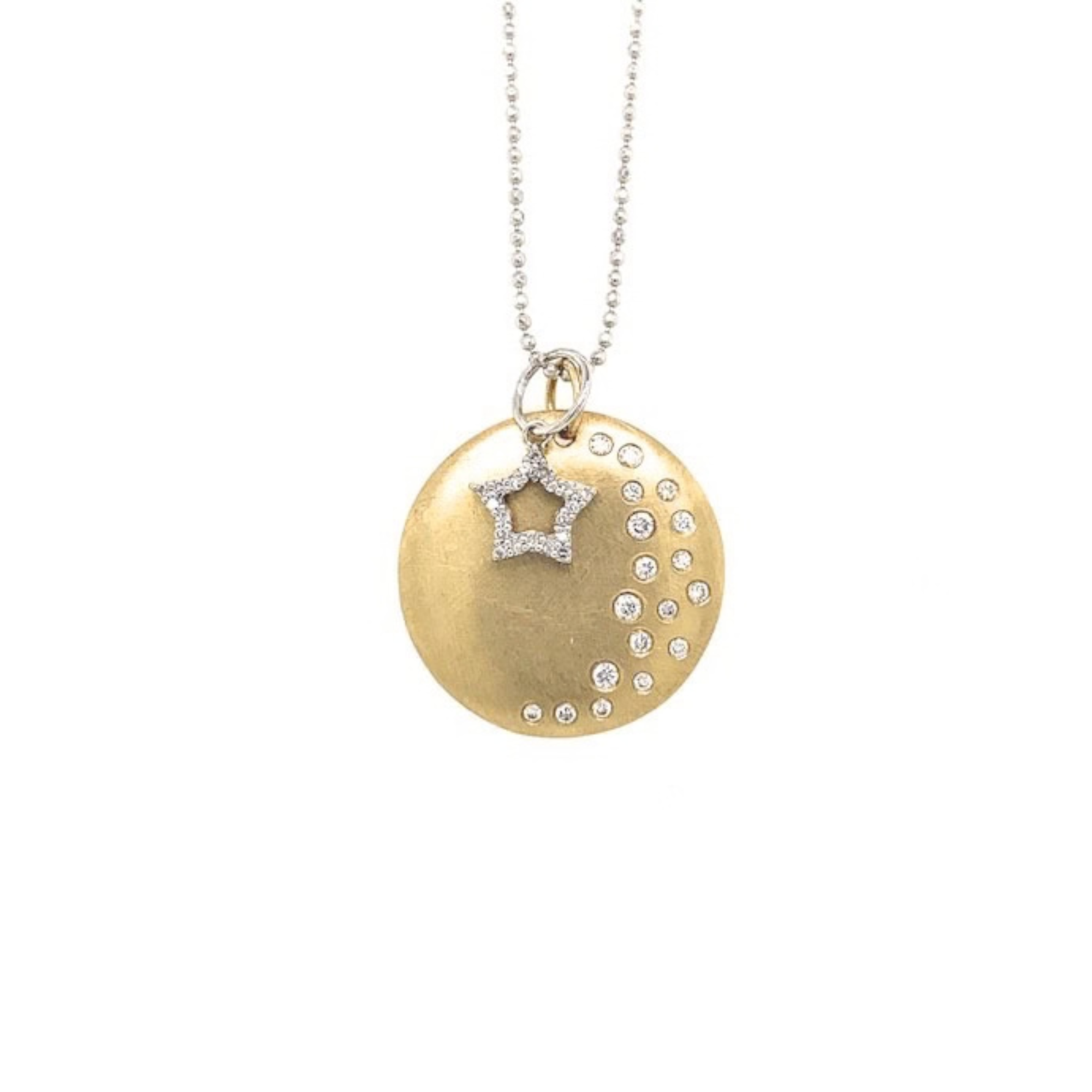 14k white gold open star charm with white diamonds stacked with round medallion with scattered white diamonds on white background