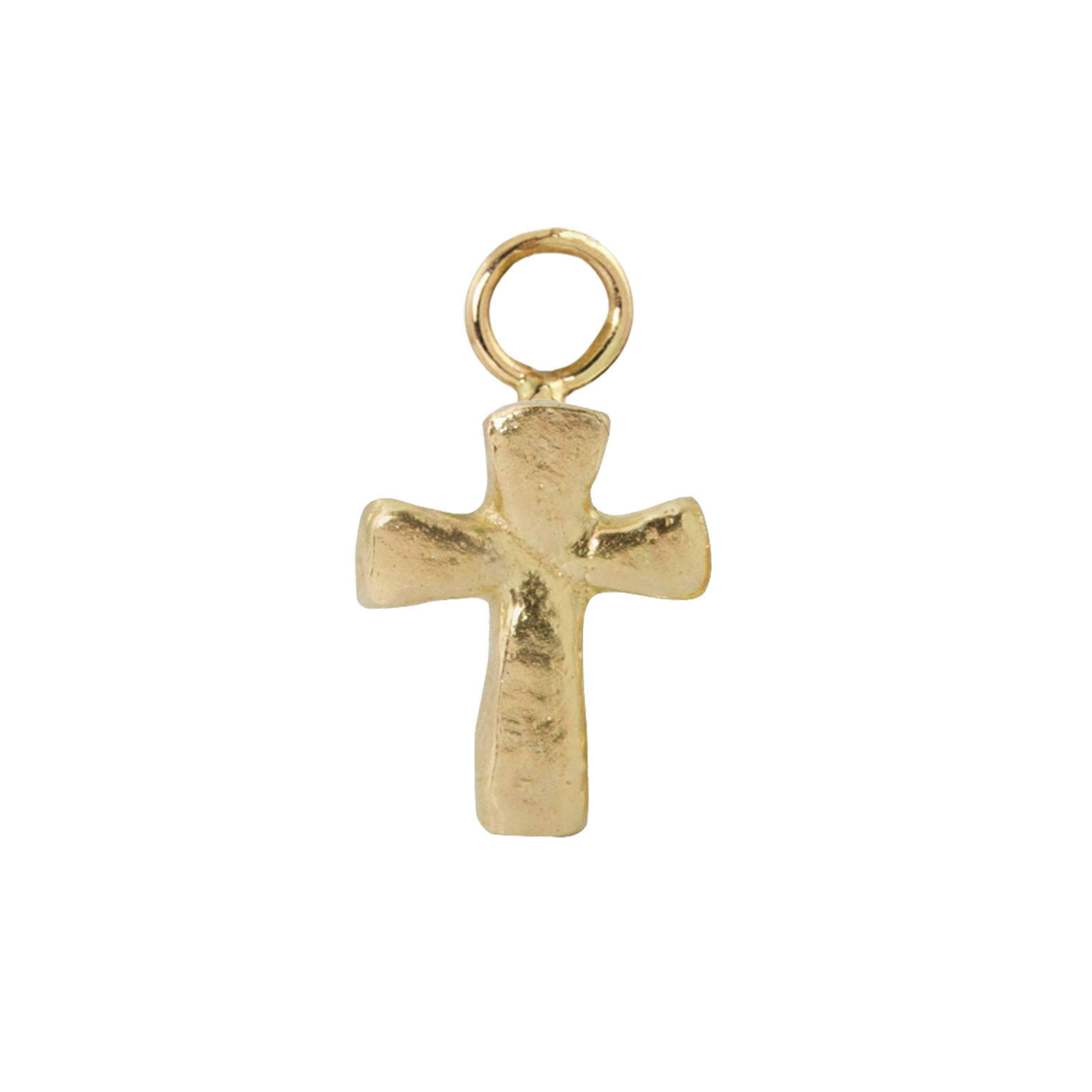 Image of a 14k yellow gold cross charm by julez bryant on a white background.