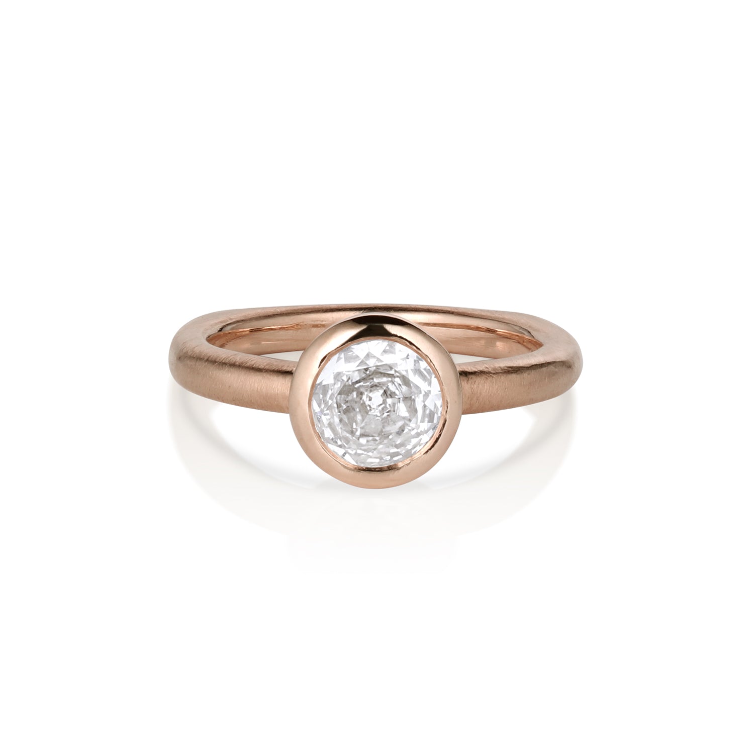 Olivia rose gold solitaire engagement ring bezel set satin finish European shank.