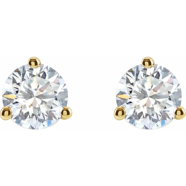 A pair of 14k yellow gold stud earrings with lab-grown diamond centers, set in classic 3-prong settings.