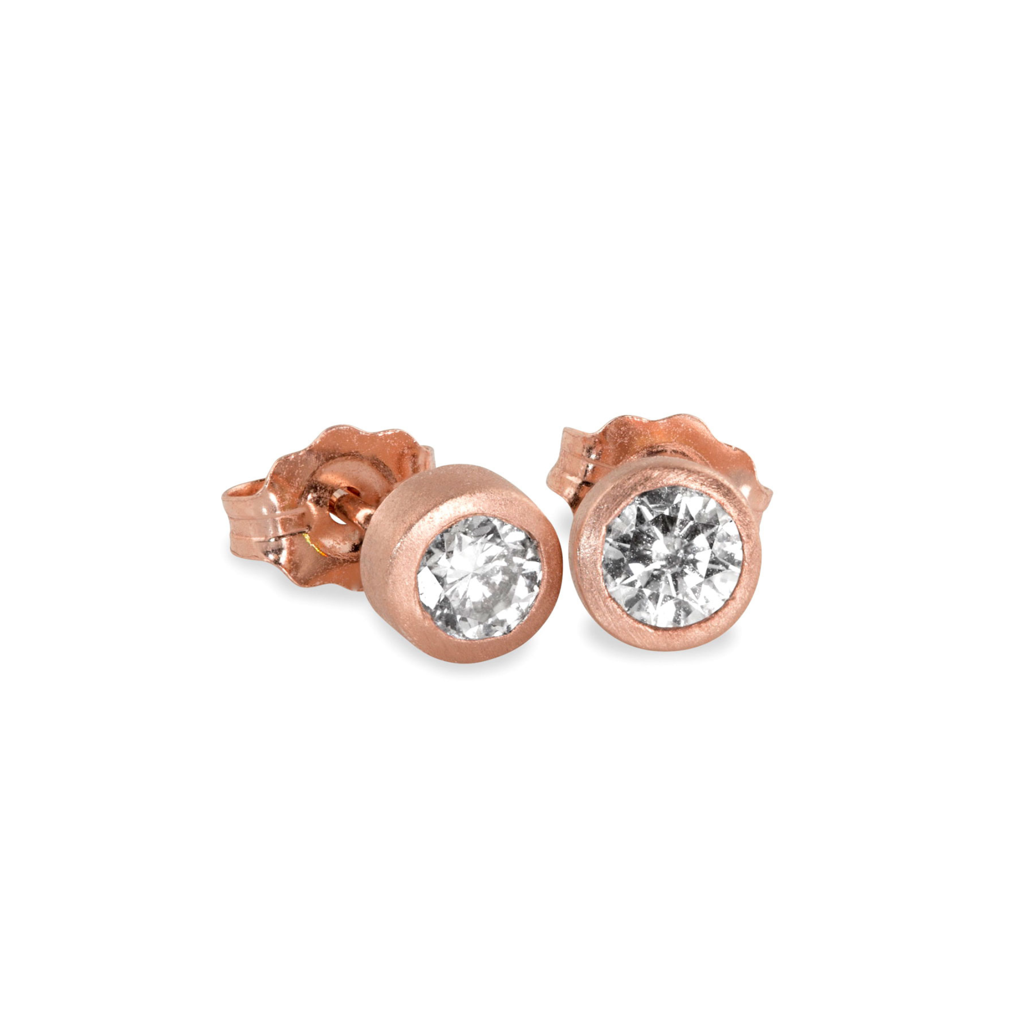 14k rose gold round bezel set white diamond stud earrings on white background