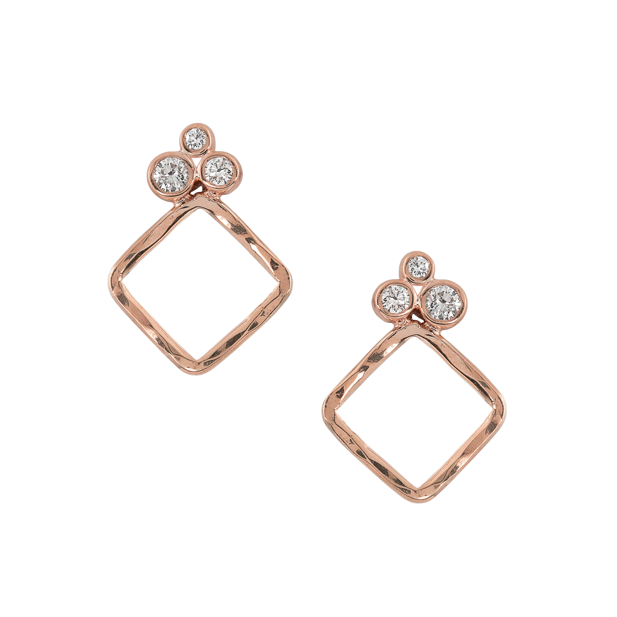 14k rose gold diamond trio with diamond shaped gold drop earrings on white background