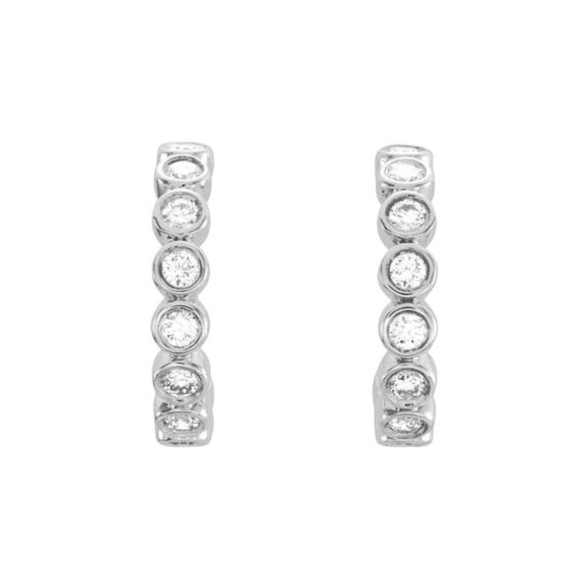 14k white gold hoop earrings with bezel set white diamonds on white background